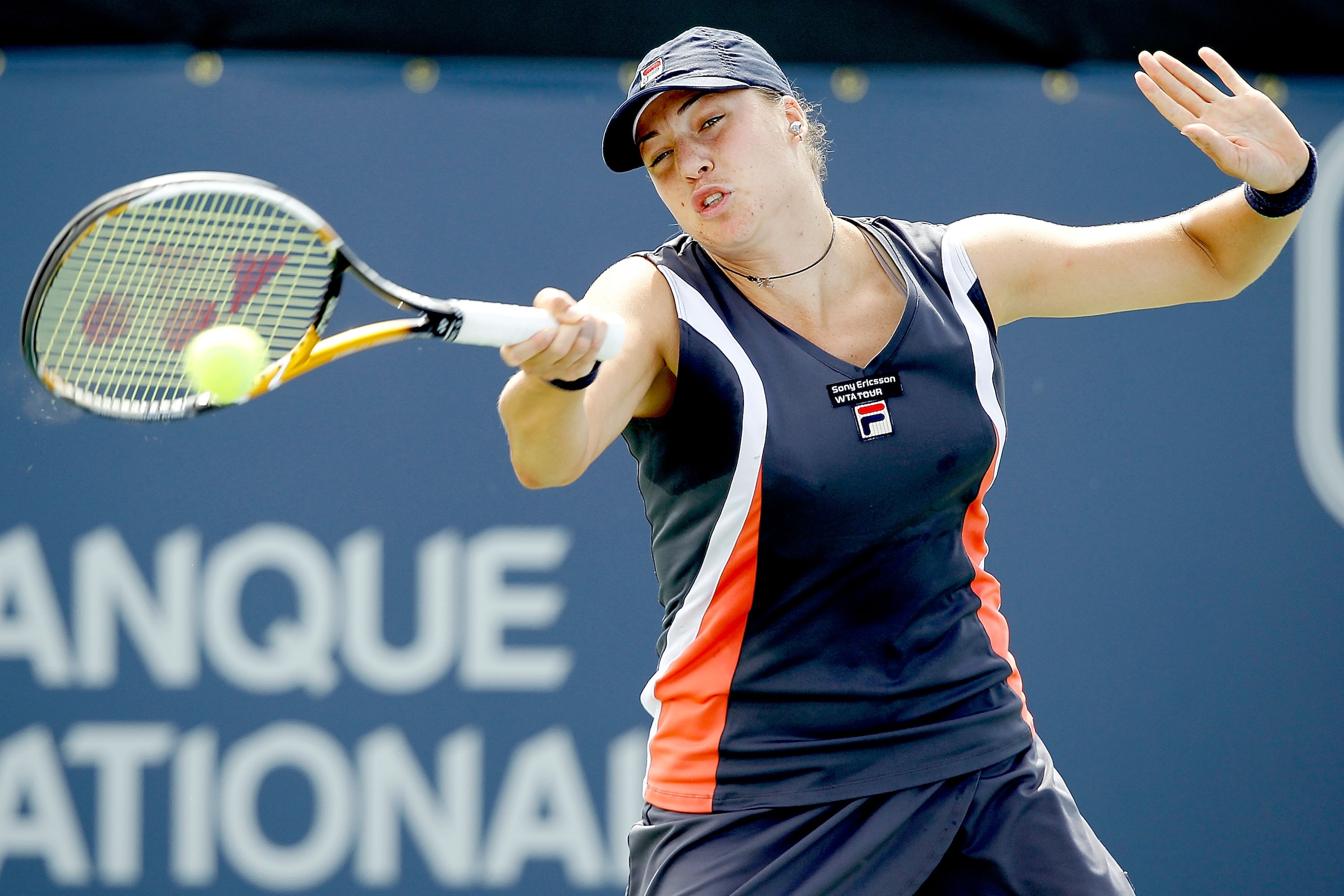 MONTREAL, QC - AUGUST 18:  Alisa Kleybanova of Russia returns a shot to Flavia Pennetta of Italy during the Rogers Cup at Stade Uniprix on August 18, 2010 in Montreal, Canada.  (Photo by Matthew Stockman/Getty Images)