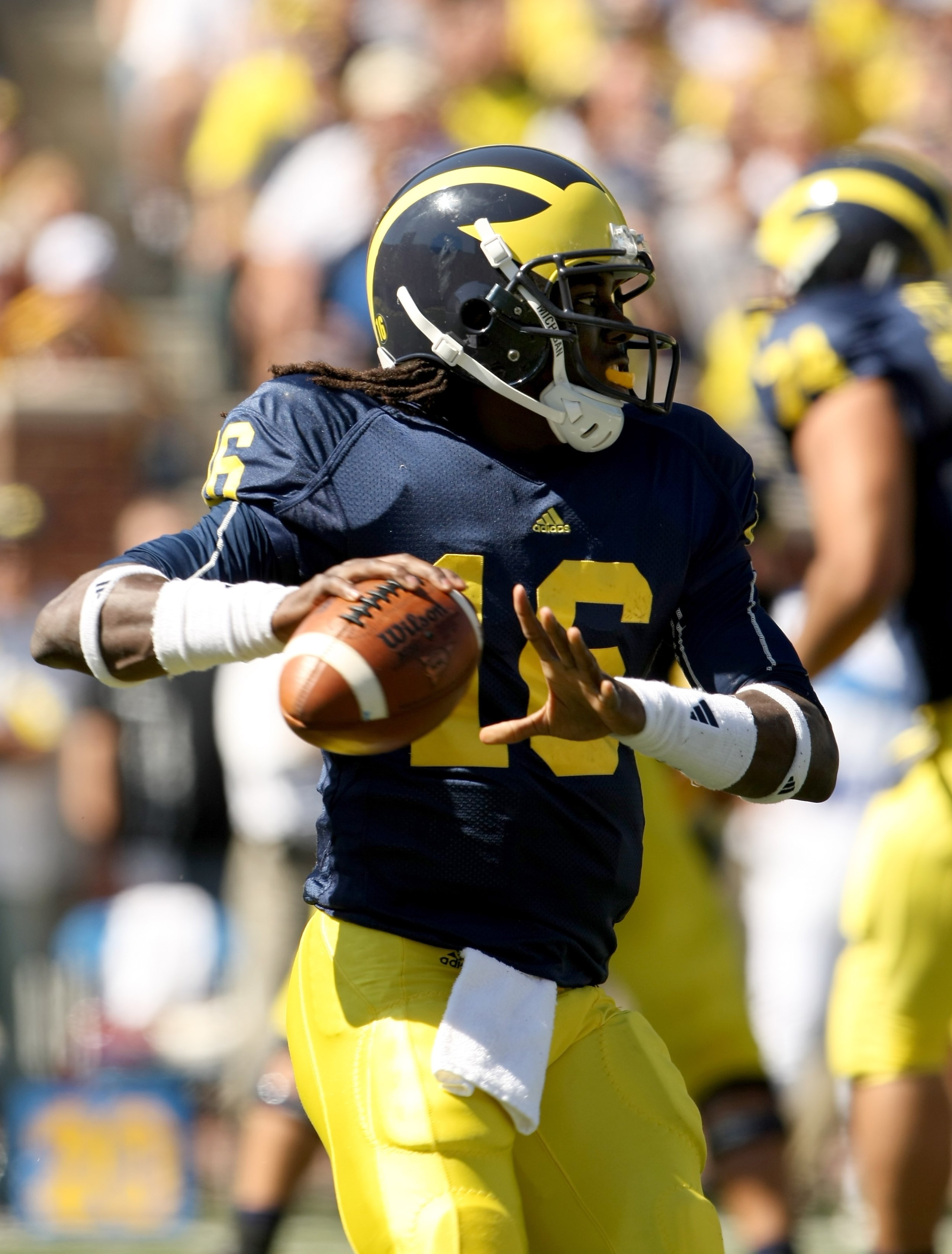 ANN ARBOR, MI - SEPTEMBER 19:  Quarterback Denard Robinson #16 of the Michigan Wolverines throws a pass against the Eastern Michigan Eagles at Michigan Stadium on September 19, 2009 in Ann Arbor, Michigan.  Michigan won 45-17.  (Photo by Stephen Dunn/Gett
