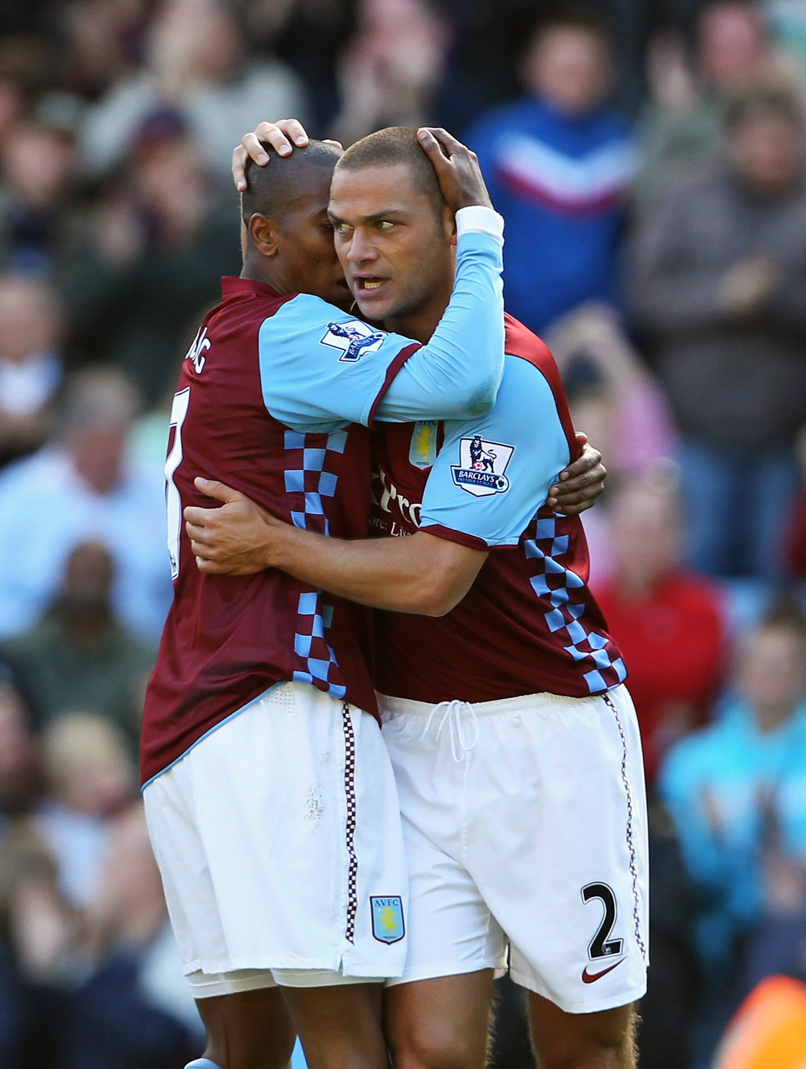 BIRMINGHAM, ENGLAND - AUGUST 29:  Luke Young (R) gets congratulated by Ashley Young of Aston Villa after scoring during the Barclays Premier League match between Aston Villa and Everton at Villa Park on August 29, 2010 in Birmingham, England.  (Photo by P