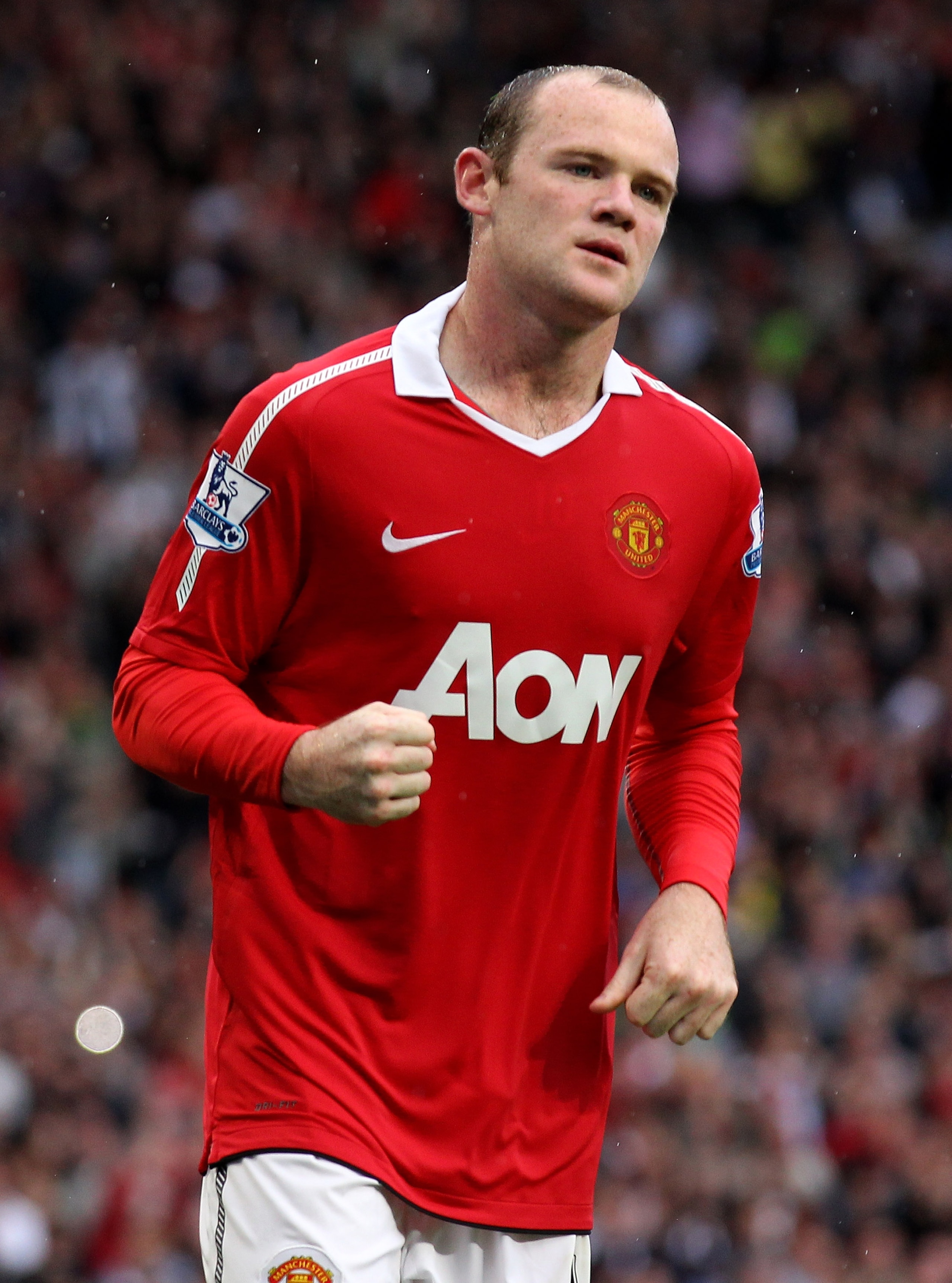 MANCHESTER, ENGLAND - AUGUST 28:  Wayne Rooney of Manchester United celebrates scoring the opening goal during the Barclays Premier League match between Manchester United and West Ham United at Old Trafford on August 28, 2010 in Manchester, England. (Phot