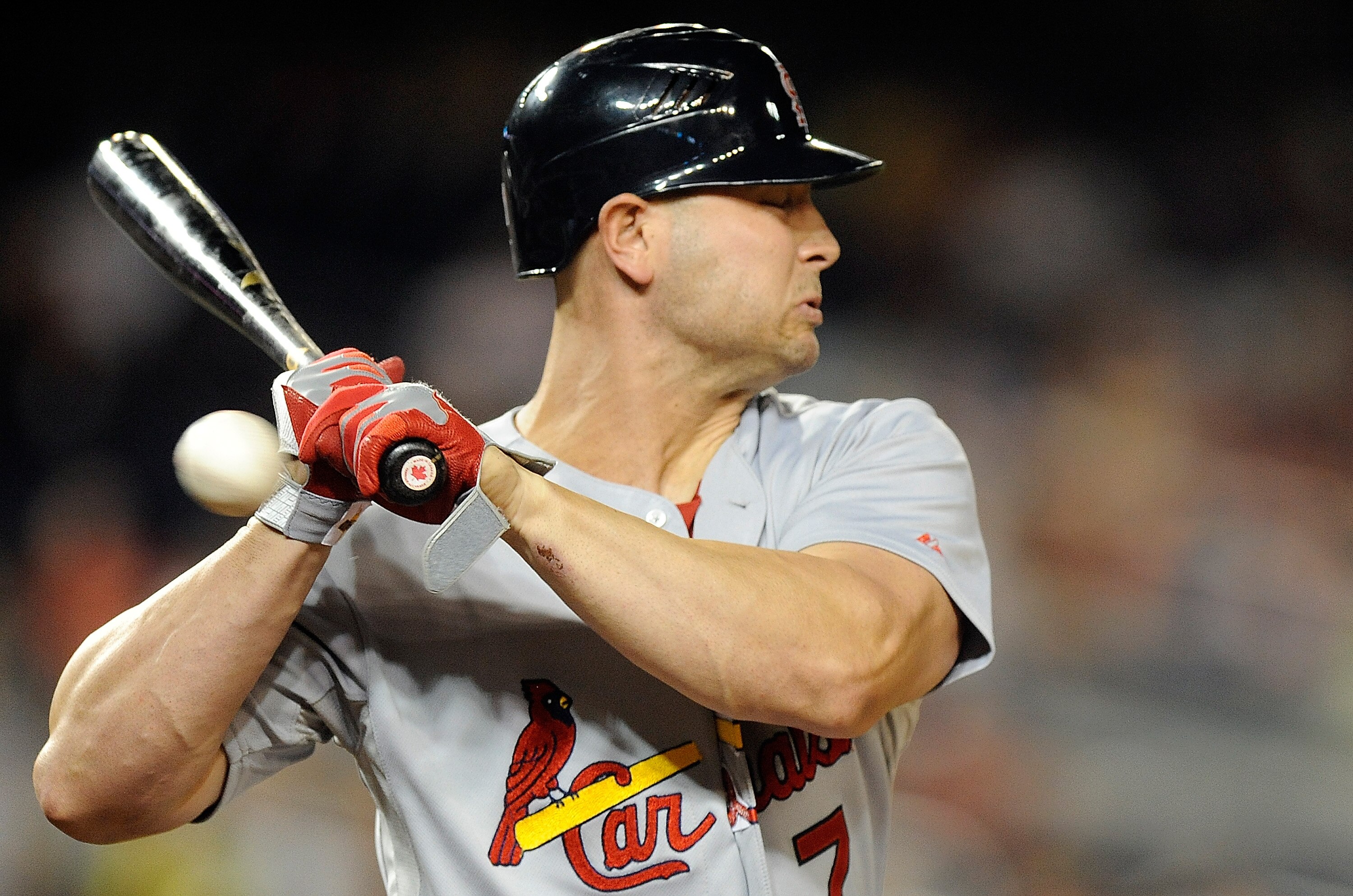 WASHINGTON - AUGUST 26:  Matt Holliday #7 of the St. Louis Cardinals is hit by a pitch in the ninth inning against the Washington Nationals at Nationals Park on August 26, 2010 in Washington, DC. The tying run scored on the play. (Photo by Greg Fiume/Gett