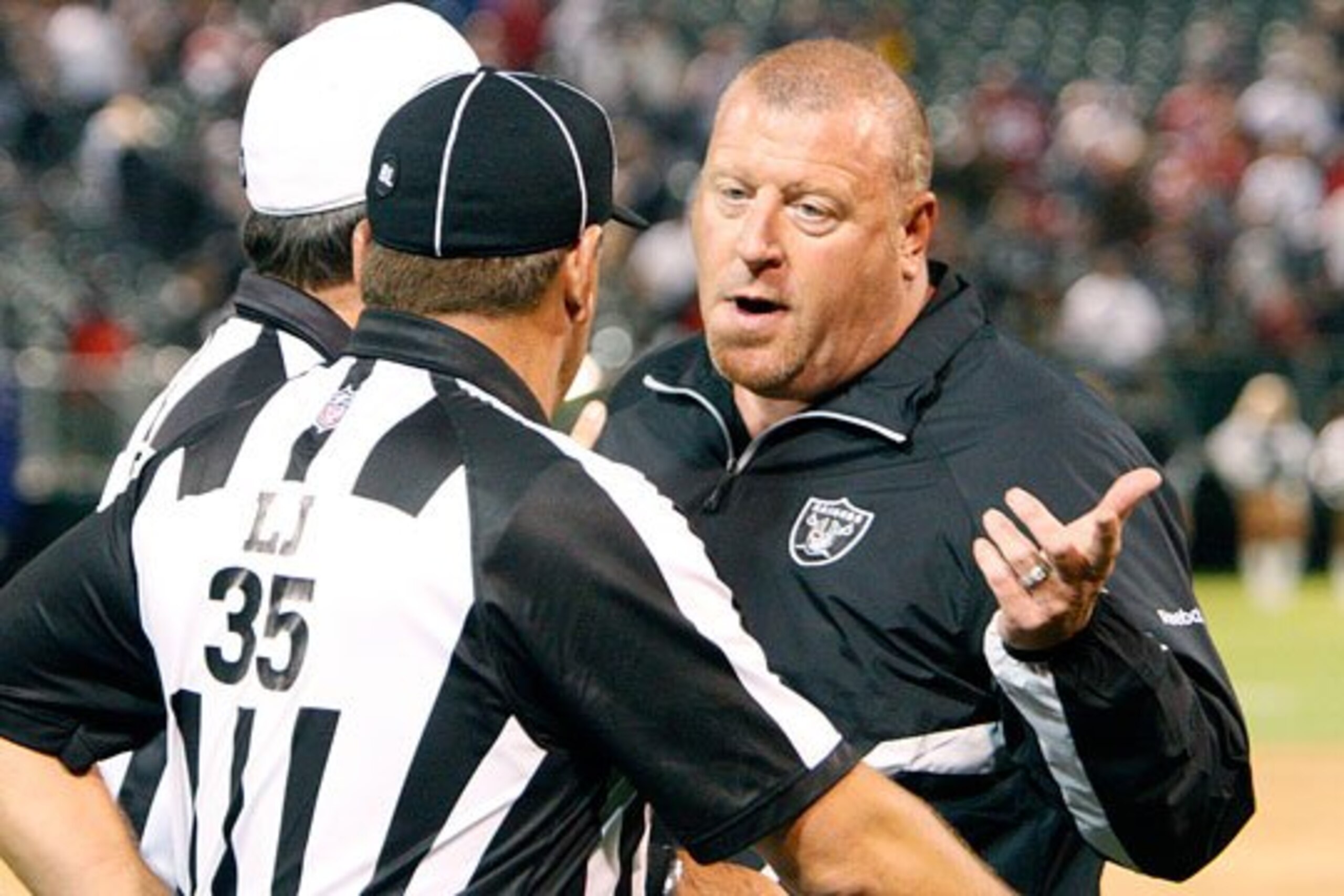 Coach Cable argues a bad call with the officials.