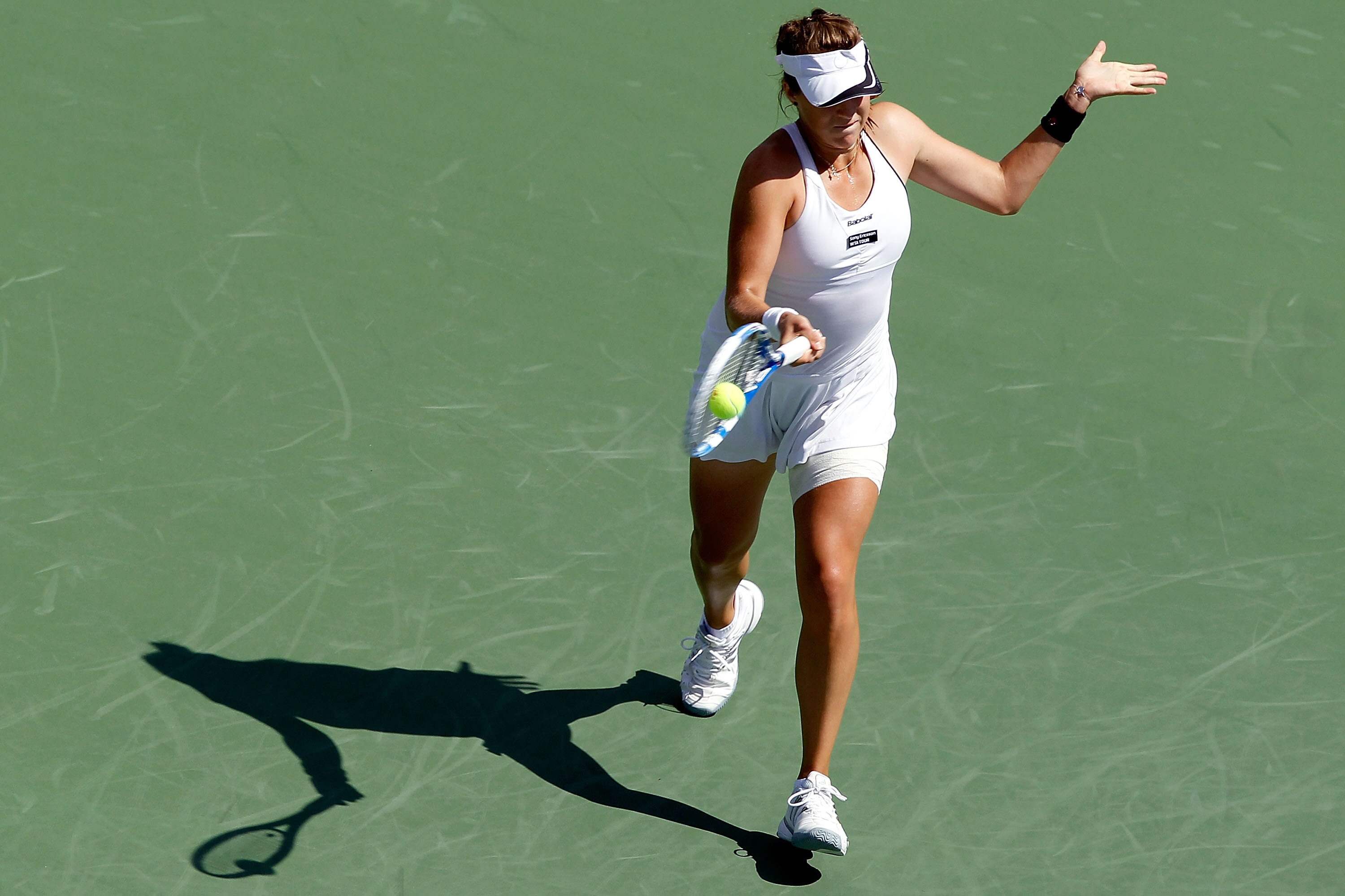 MONTREAL, QC - AUGUST 17:  Anastasia Pavlyuchenkova of Russia returns a shot to Svetlana Kuznetsova pf Russia during the Rogers Cup at Stade Uniprix on August 17, 2010 in Montreal, Canada.  (Photo by Matthew Stockman/Getty Images)