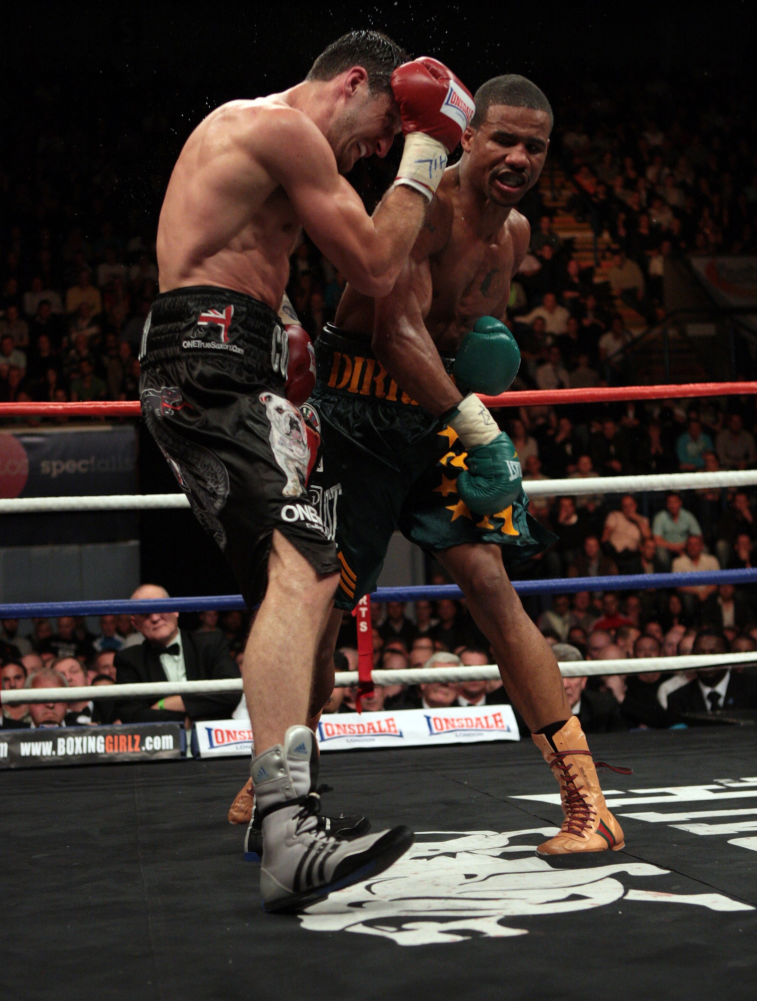 NOTTINGHAM, ENGLAND - OCTOBER 17:  Andre Dirrell attacks Carl Froch during their WBC Super Middleweight fight on October 17, 2009 at Trent FM Arena in Nottingham, England.  (Photo by John Gichigi/Getty Images)