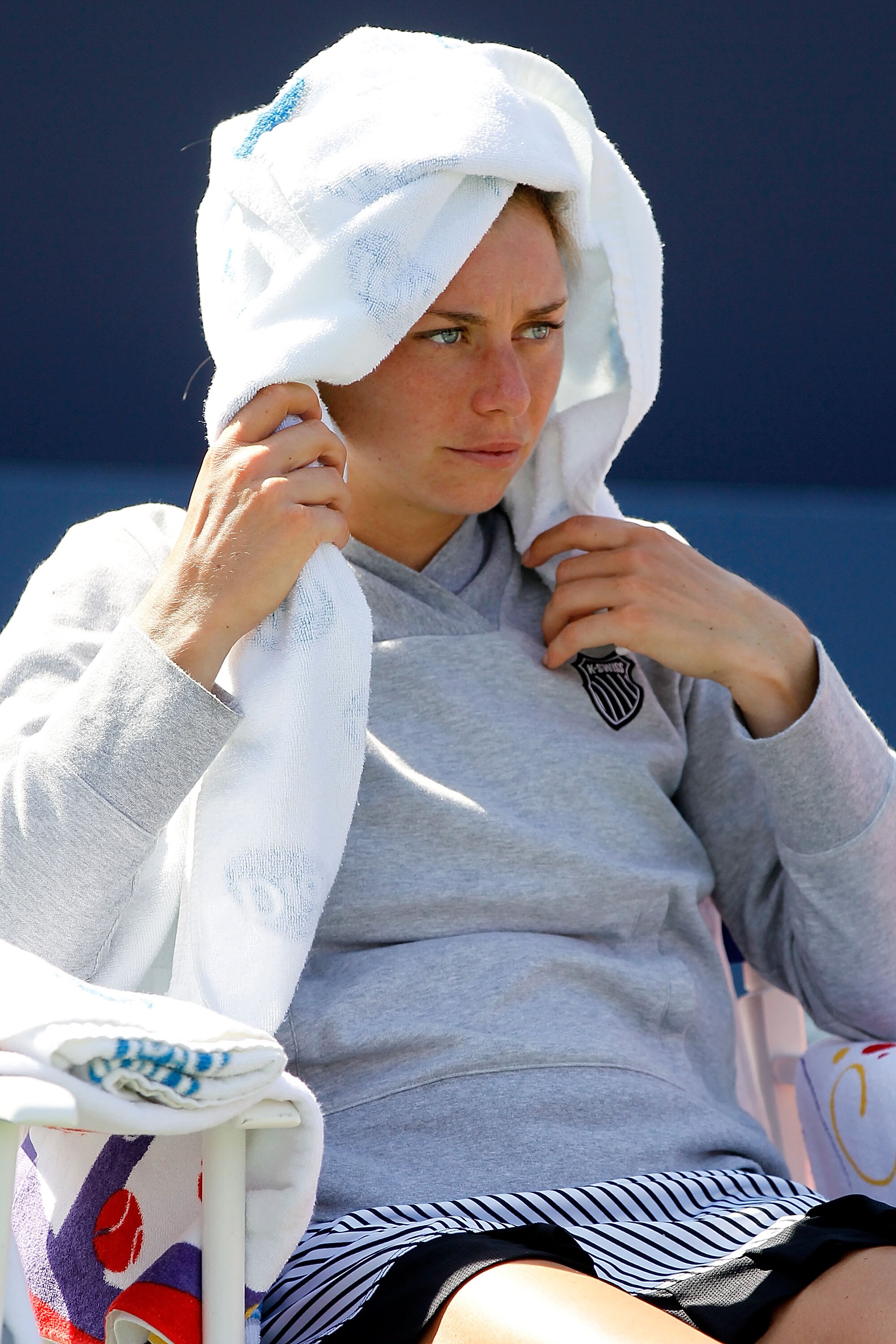 MONTREAL, QC - AUGUST 23:  Vera Zvonareva of Russia cools down after the match against Caroline Wozniacki of Denmark during the final of the  Rogers Cup at Stade Uniprix on August 23, 2010 in Montreal, Canada.  (Photo by Matthew Stockman/Getty Images)