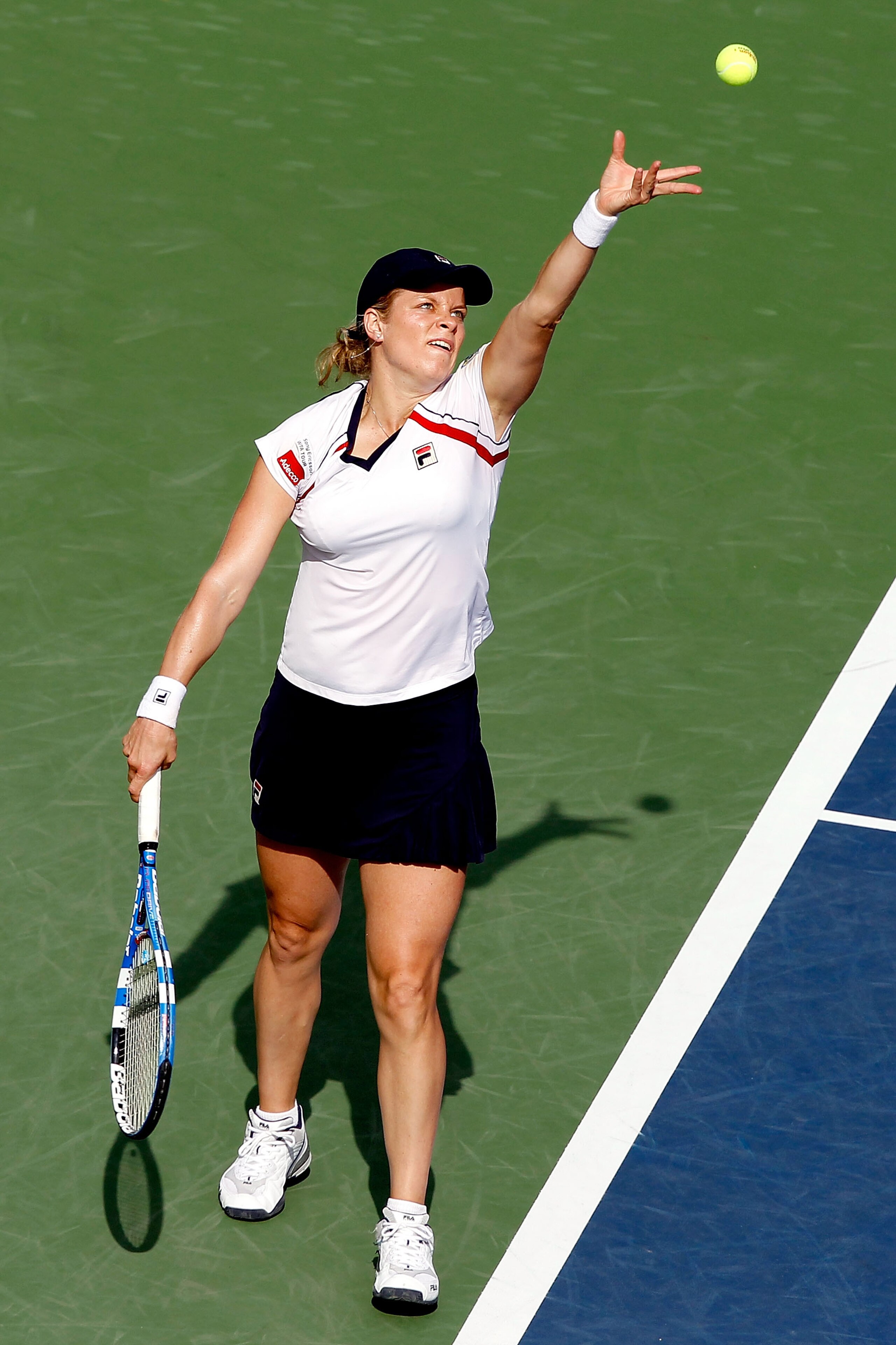 MONTREAL, QC - AUGUST 19:  Kim Clijsters of Belgium serves to Kaia Kanepi of Estonia during the Rogers Cup at Stade Uniprix on August 19, 2010 in Montreal, Canada.  (Photo by Matthew Stockman/Getty Images)