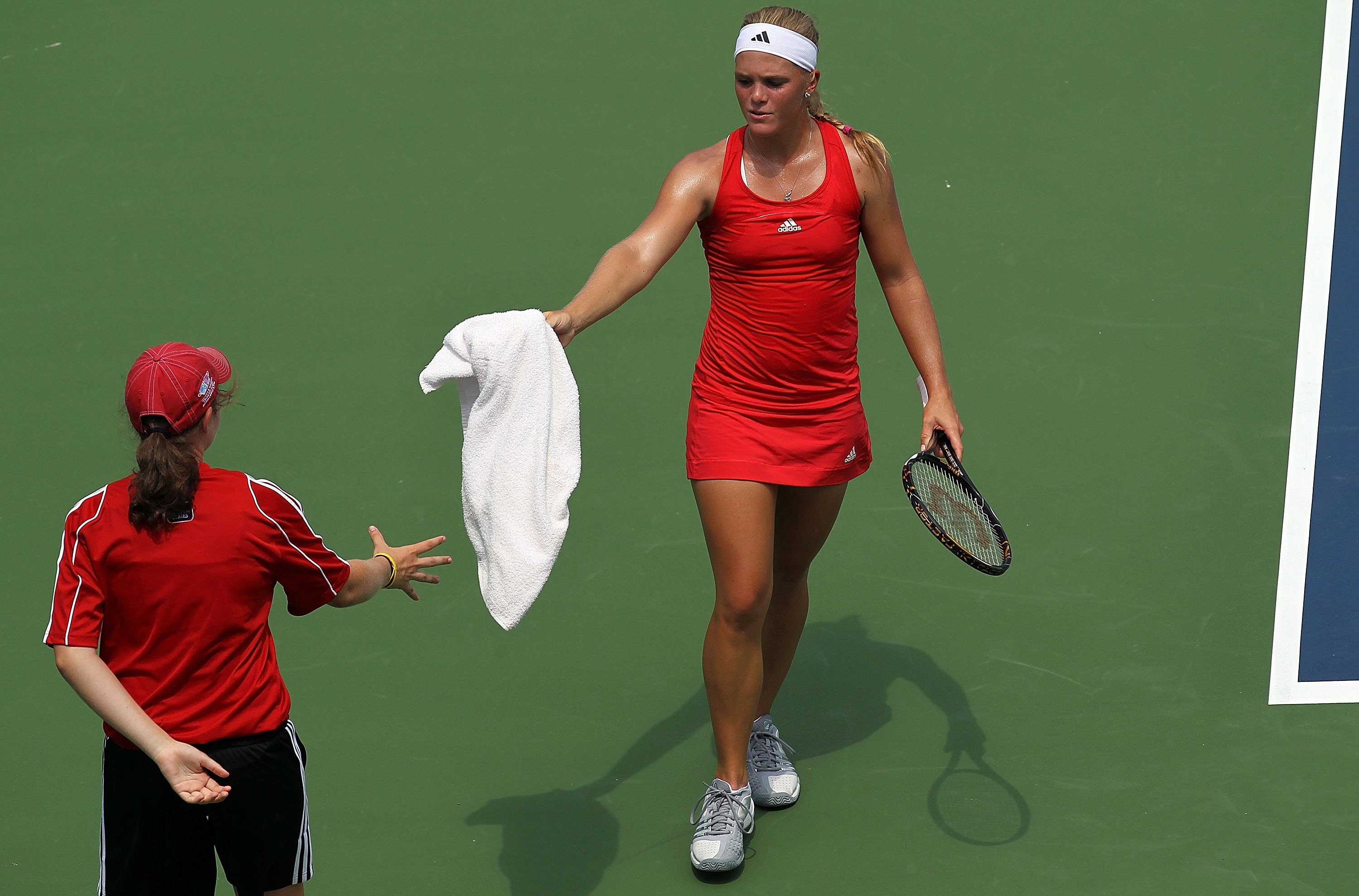 CINCINNATI - AUGUST 10: Melanie Oudin towels off during day two of the Western & Southern Financial Group Women's Open on August 10, 2010 at the Lindner Family Tennis Center in Cincinnati, Ohio. (Photo by Ronald Martinez/Getty Images) CINCINNATI - AUGUST 10: Melanie Oudin towels off during day two of the Western & Southern Financial Group Women's Open on August 10, 2010 at the Lindner Family Tennis Center in Cincinnati, Ohio. (Photo by Ronald Martinez/Getty Images)