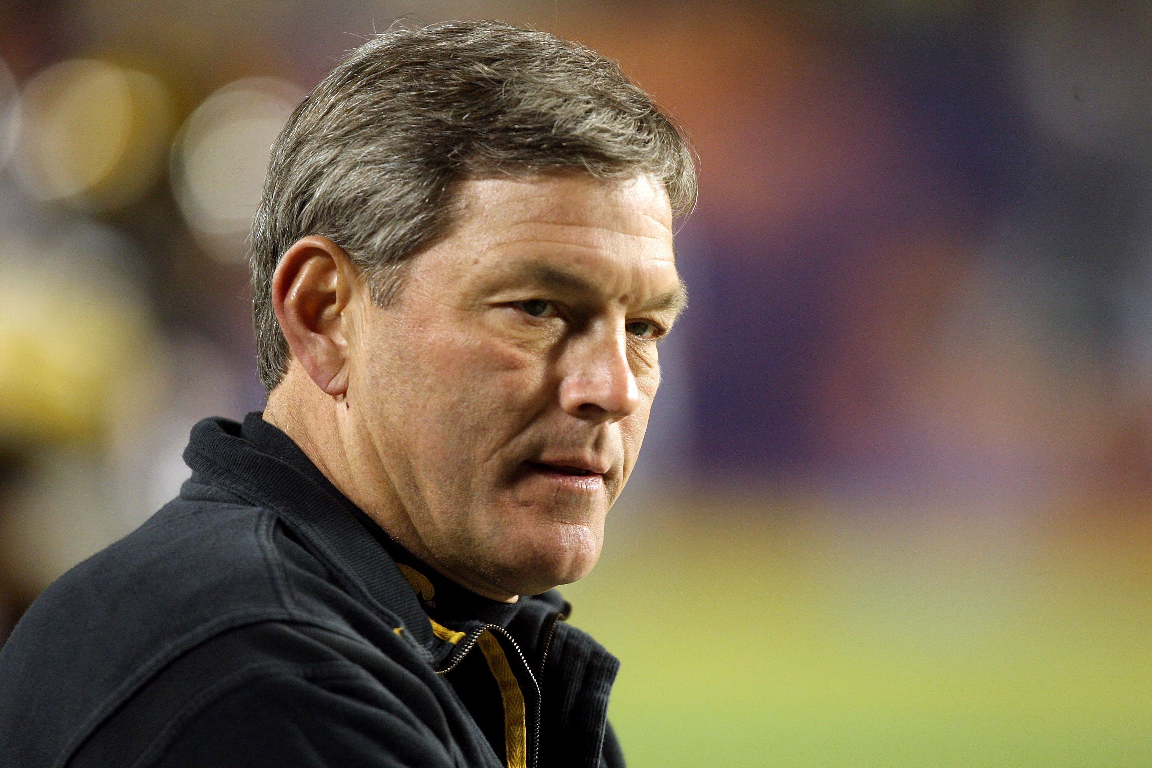 MIAMI GARDENS, FL - JANUARY 05:  Head coach Kirk Ferentz of the Iowa Hawkeyes looks on during warm ups against the Georgia Tech Yellow Jackets during the FedEx Orange Bowl at Land Shark Stadium on January 5, 2010 in Miami Gardens, Florida. Iowa won 24-14.
