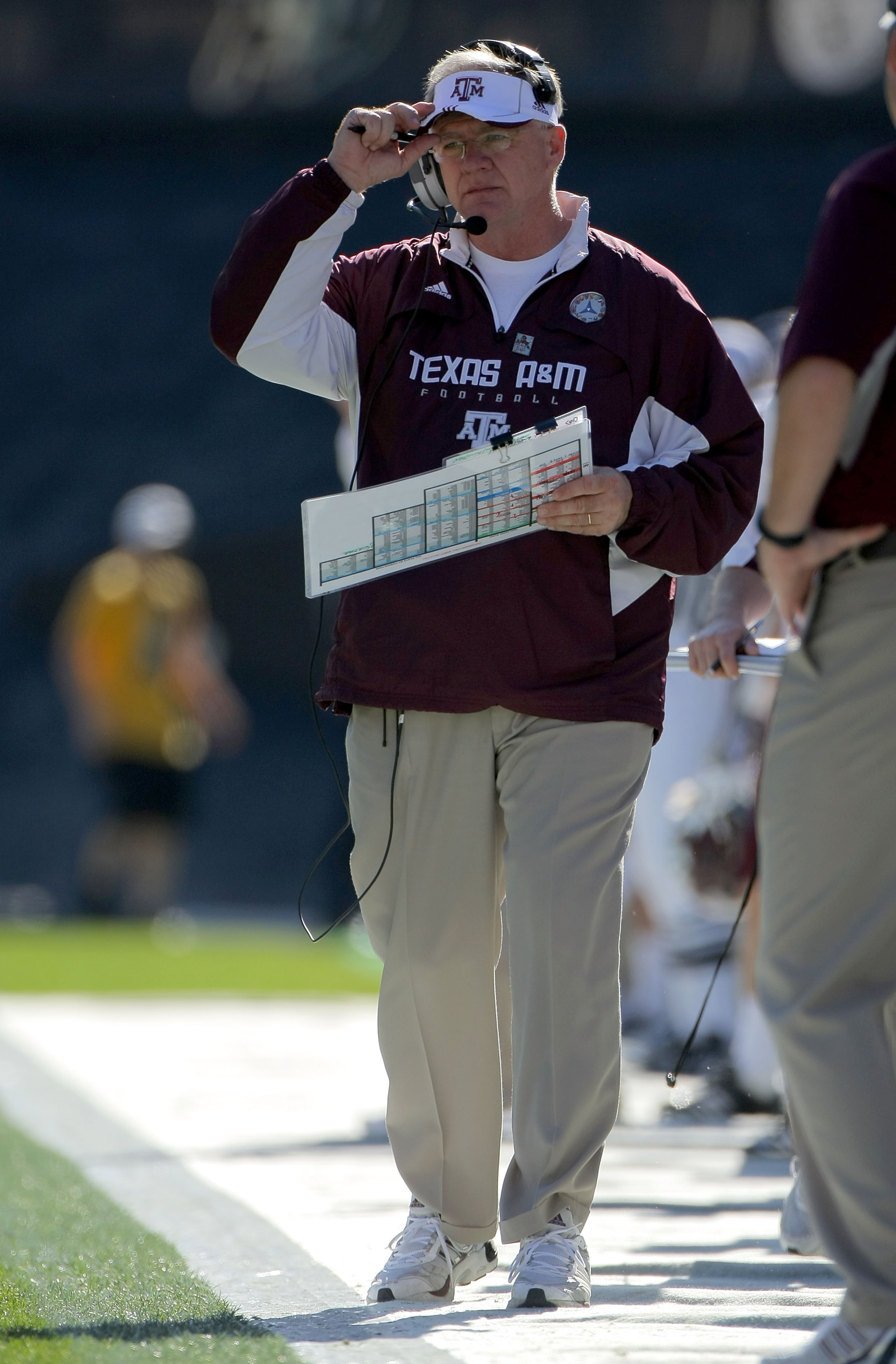 BOULDER, CO - NOVEMBER 07: Head coach Mike Sherman of the Texas A&M Aggies leads his team against the Colorado Buffaloes during NCAA college football action at Folsom Field on November 7, 2009 in Boulder, Colorado. Colorado defeated Texas A&M 35-34. (Ph BOULDER, CO - NOVEMBER 07: Head coach Mike Sherman of the Texas A&M Aggies leads his team against the Colorado Buffaloes during NCAA college football action at Folsom Field on November 7, 2009 in Boulder, Colorado. Colorado defeated Texas A&M 35-34. (Ph