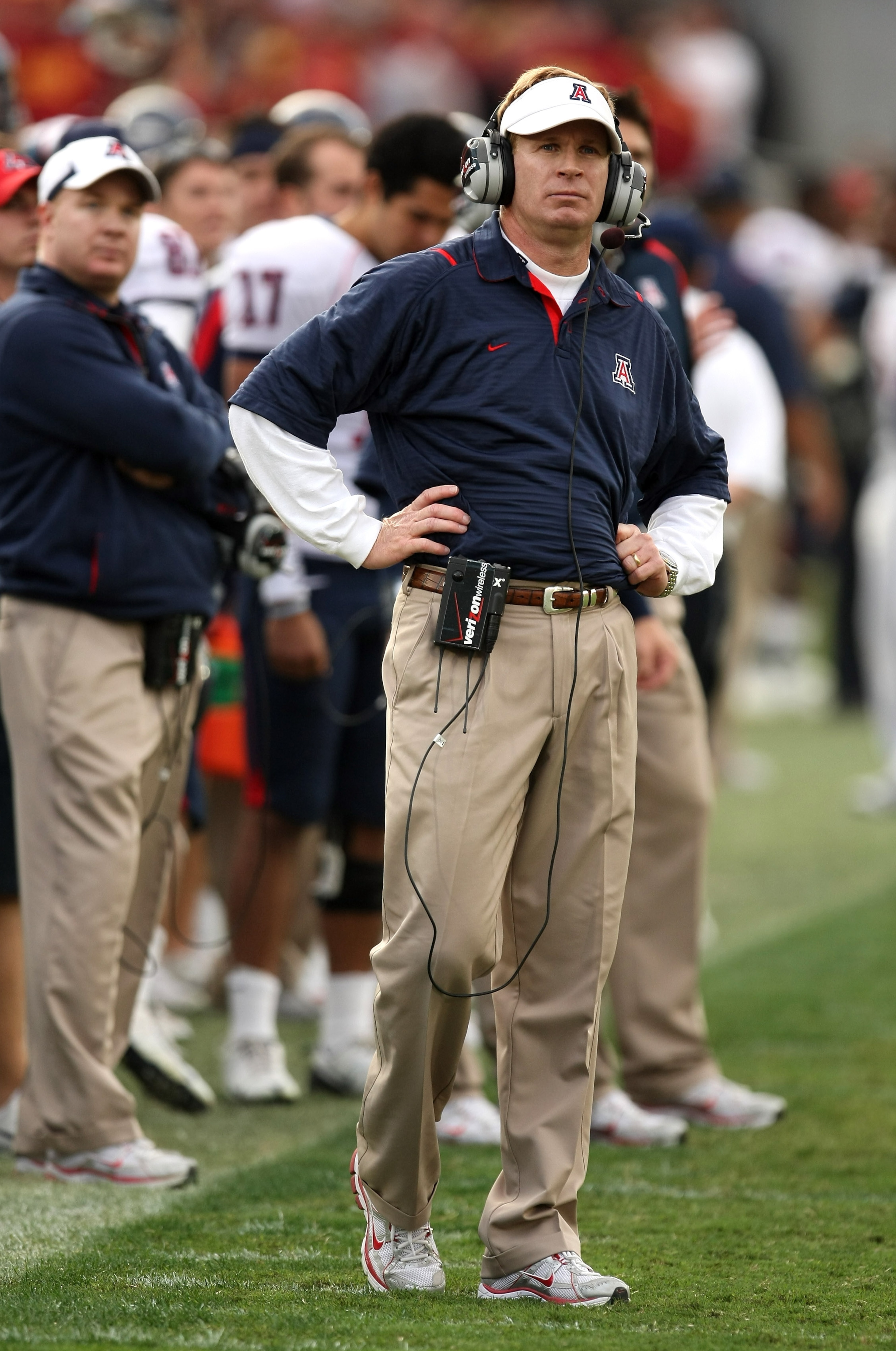 LOS ANGELES - DECEMBER 5: Head coach Mike Stoops of the Arizona Wildcats watches as the clock counts down in the final minute against the USC Trojans on December 5, 2009 at the Los Angeles Coliseum in Los Angeles, California. Arizona won 21-17. (Photo LOS ANGELES - DECEMBER 5: Head coach Mike Stoops of the Arizona Wildcats watches as the clock counts down in the final minute against the USC Trojans on December 5, 2009 at the Los Angeles Coliseum in Los Angeles, California. Arizona won 21-17. (Photo