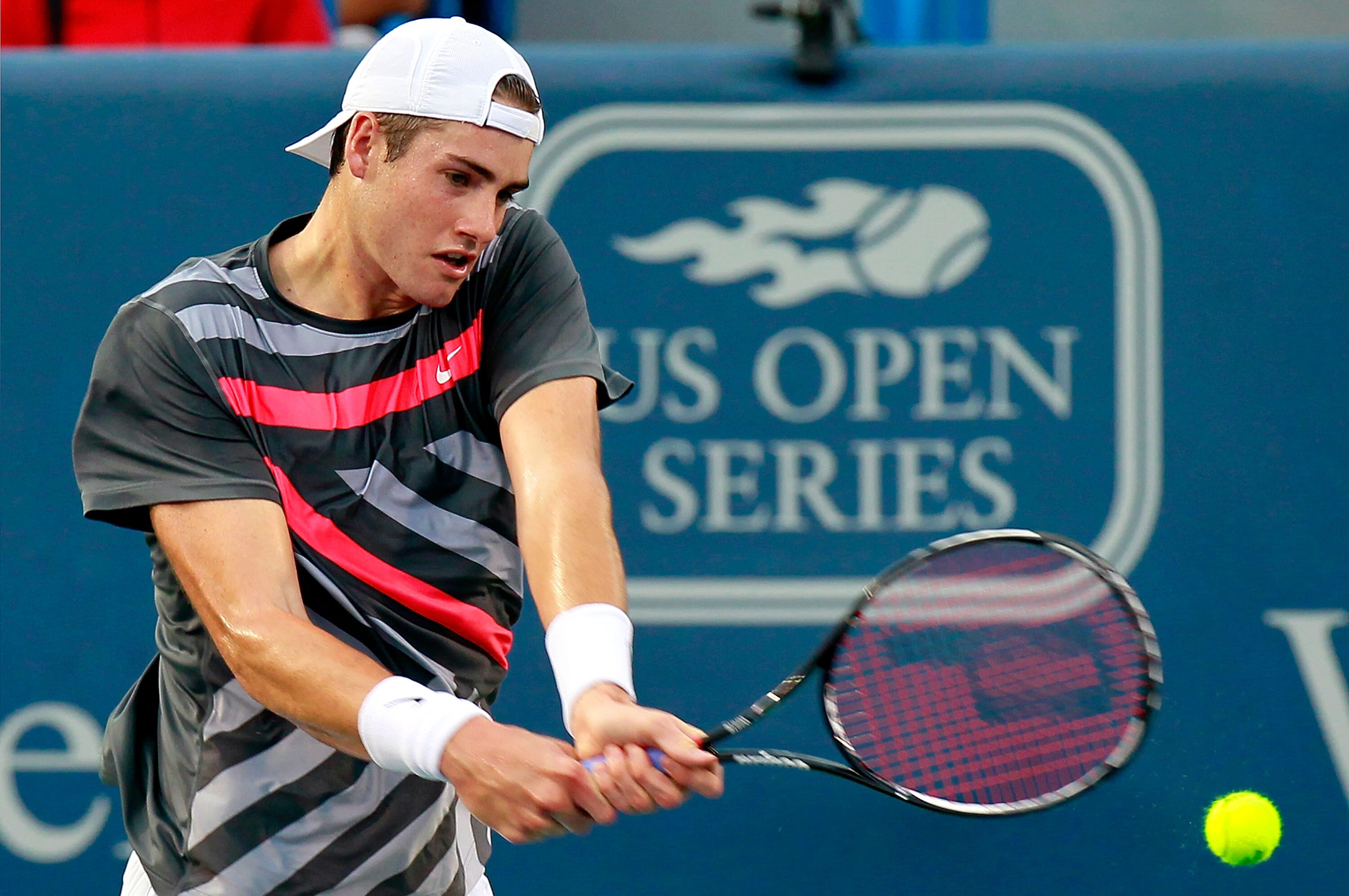 CINCINNATI - AUGUST 17: John Isner returns a backhand to Lukasz Kubot of Poland during Day 2 of the Western & Southern Financial Group Masters at the Lindner Family Tennis Center on August 17, 2010 in Cincinnati, Ohio. (Photo by Kevin C. Cox/Getty Image CINCINNATI - AUGUST 17: John Isner returns a backhand to Lukasz Kubot of Poland during Day 2 of the Western & Southern Financial Group Masters at the Lindner Family Tennis Center on August 17, 2010 in Cincinnati, Ohio. (Photo by Kevin C. Cox/Getty Image