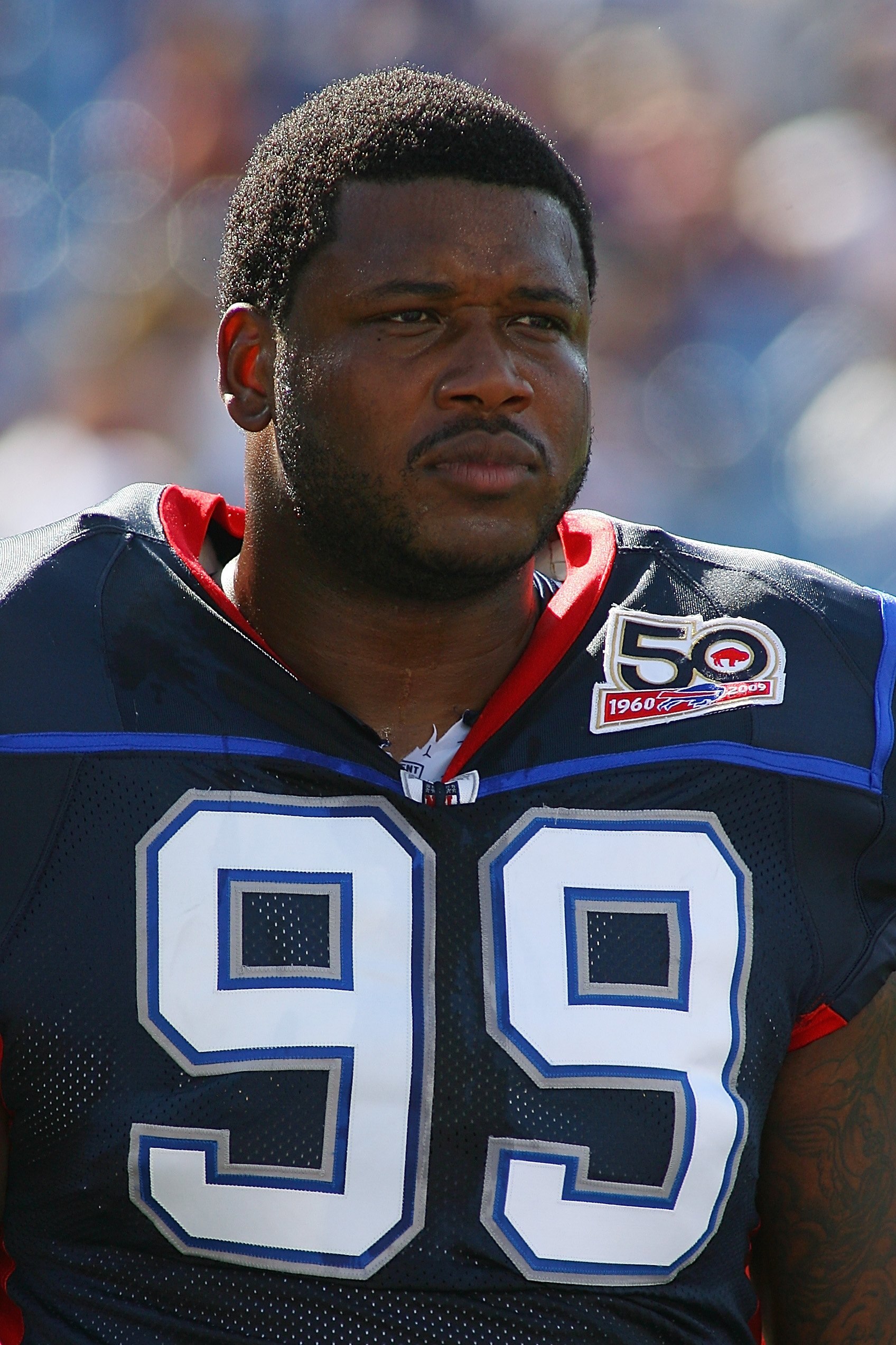 ORCHARD PARK, NY - SEPTEMBER 20:  Defensive tackle Marcus Stroud #99 of the Buffalo Bills takes a break from the action during the game against the Tampa Bay Buccaneers at Ralph Wilson Stadium on September 20, 2009 in Orchard Park, New York.  The Bills wo