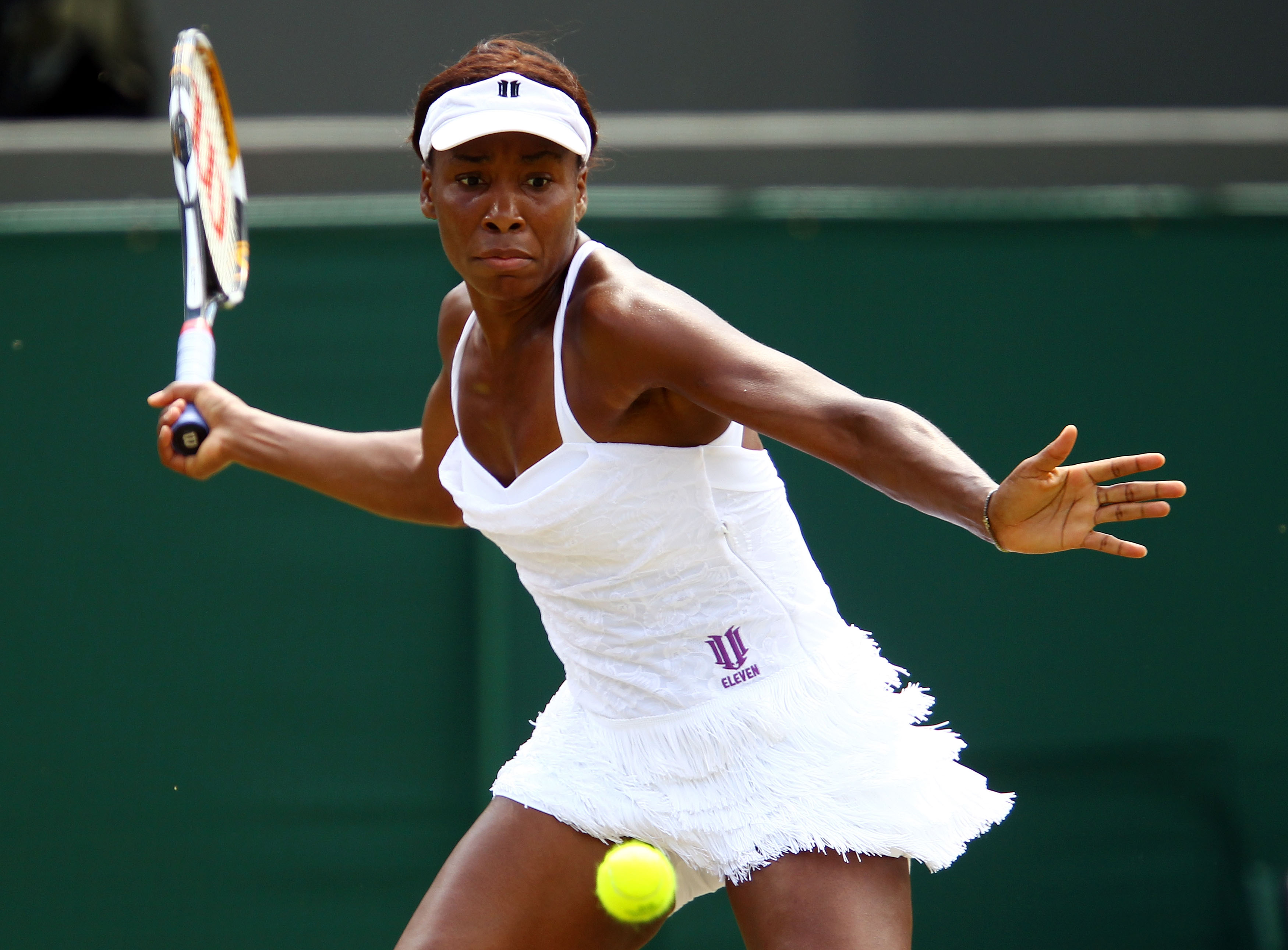 LONDON, ENGLAND - JUNE 29: Venus Williams of USA in action during her Quarter Final match against Tsvetana Pironkova of Bulgaria on Day Eight of the Wimbledon Lawn Tennis Championships at the All England Lawn Tennis and Croquet Club on June 29, 2010 in L LONDON, ENGLAND - JUNE 29: Venus Williams of USA in action during her Quarter Final match against Tsvetana Pironkova of Bulgaria on Day Eight of the Wimbledon Lawn Tennis Championships at the All England Lawn Tennis and Croquet Club on June 29, 2010 in L