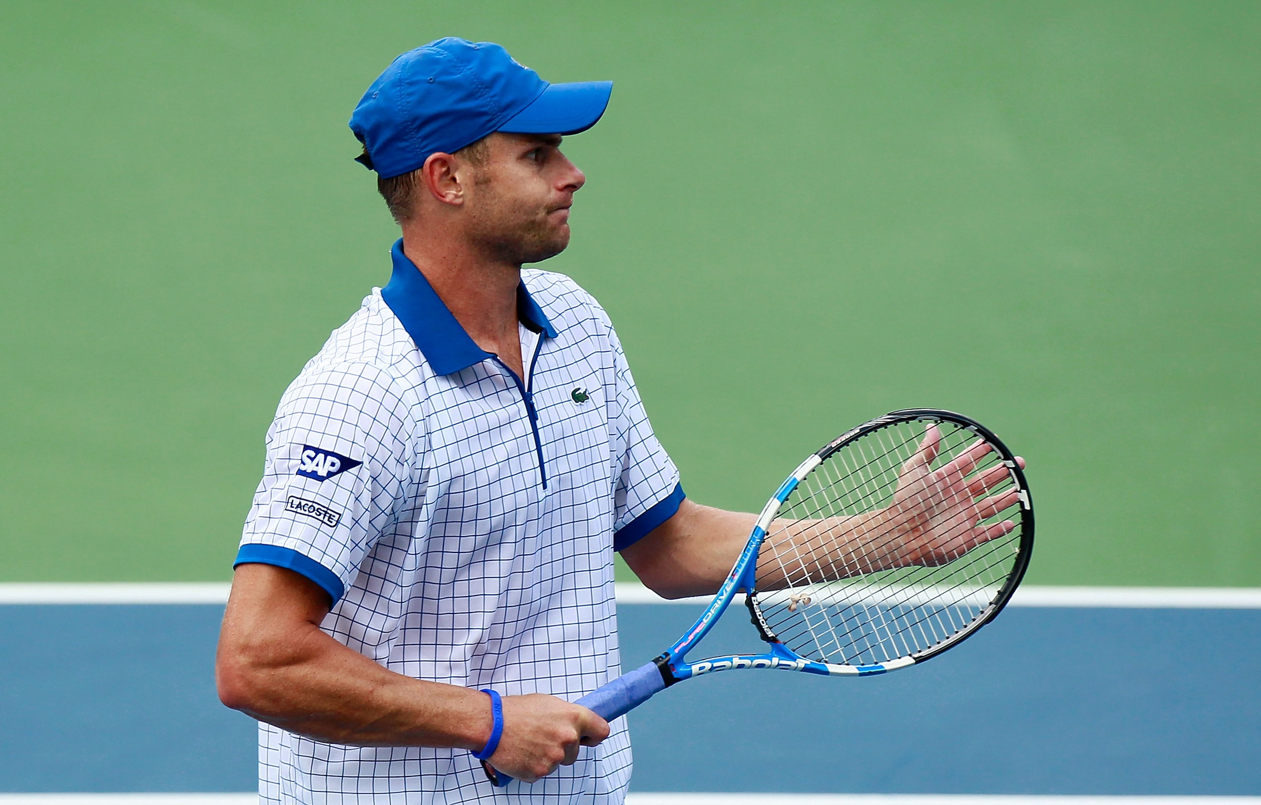 CINCINNATI - AUGUST 21:  Andy Roddick applauds a shot by Mardy Fish during the semifinals on Day 6 of the Western & Southern Financial Group Masters at the Lindner Family Tennis Center on August 21, 2010 in Cincinnati, Ohio.  (Photo by Kevin C. Cox/Getty