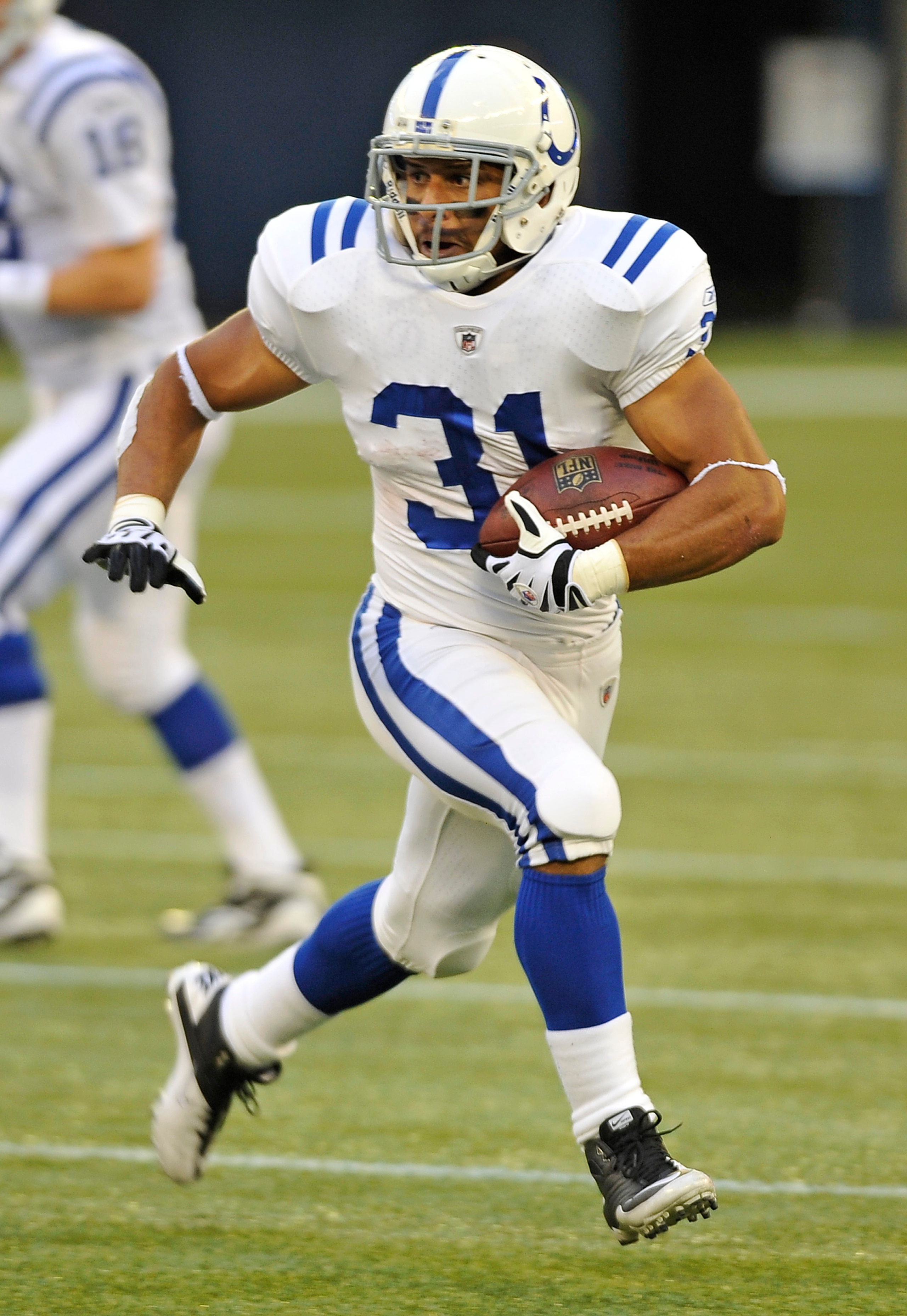 TORONTO, CANADA - AUGUST 19: Donald Brown #31 of the Indianapolis Colts runs with the ball during game action against the Buffalo Bills on August 19, 2010 at the Rogers Centre in Toronto, Ontario, Canada. (Photo by Brad White/Getty Images)