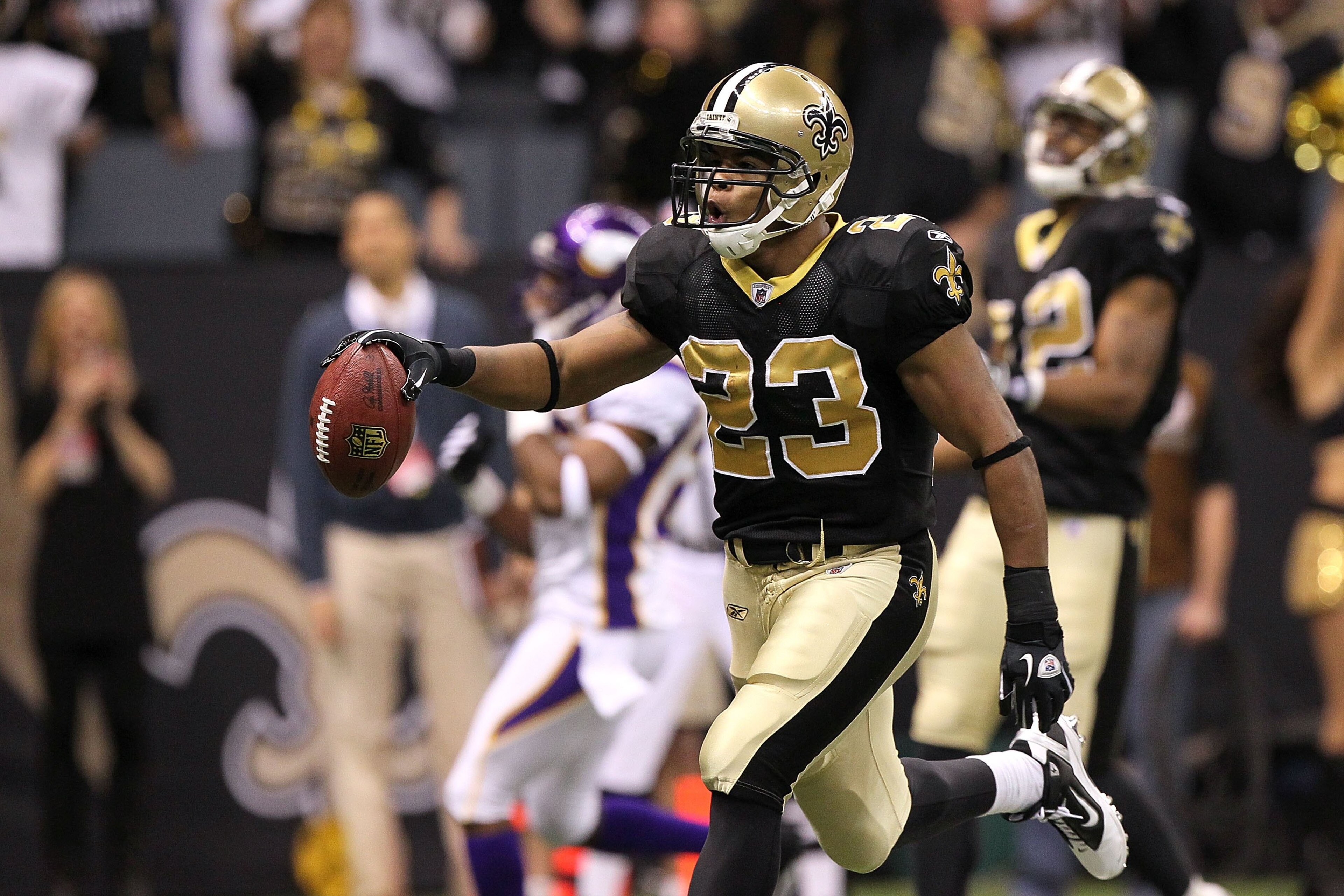 NEW ORLEANS - JANUARY 24: Pierre Thomas #23 of the New Orleans Saints celebrates after scoring a touchdown on a 38-yard pass play in the first quarter against the Minnesota Vikings during the NFC Championship Game at the Louisiana Superdome on January 24 NEW ORLEANS - JANUARY 24: Pierre Thomas #23 of the New Orleans Saints celebrates after scoring a touchdown on a 38-yard pass play in the first quarter against the Minnesota Vikings during the NFC Championship Game at the Louisiana Superdome on January 24