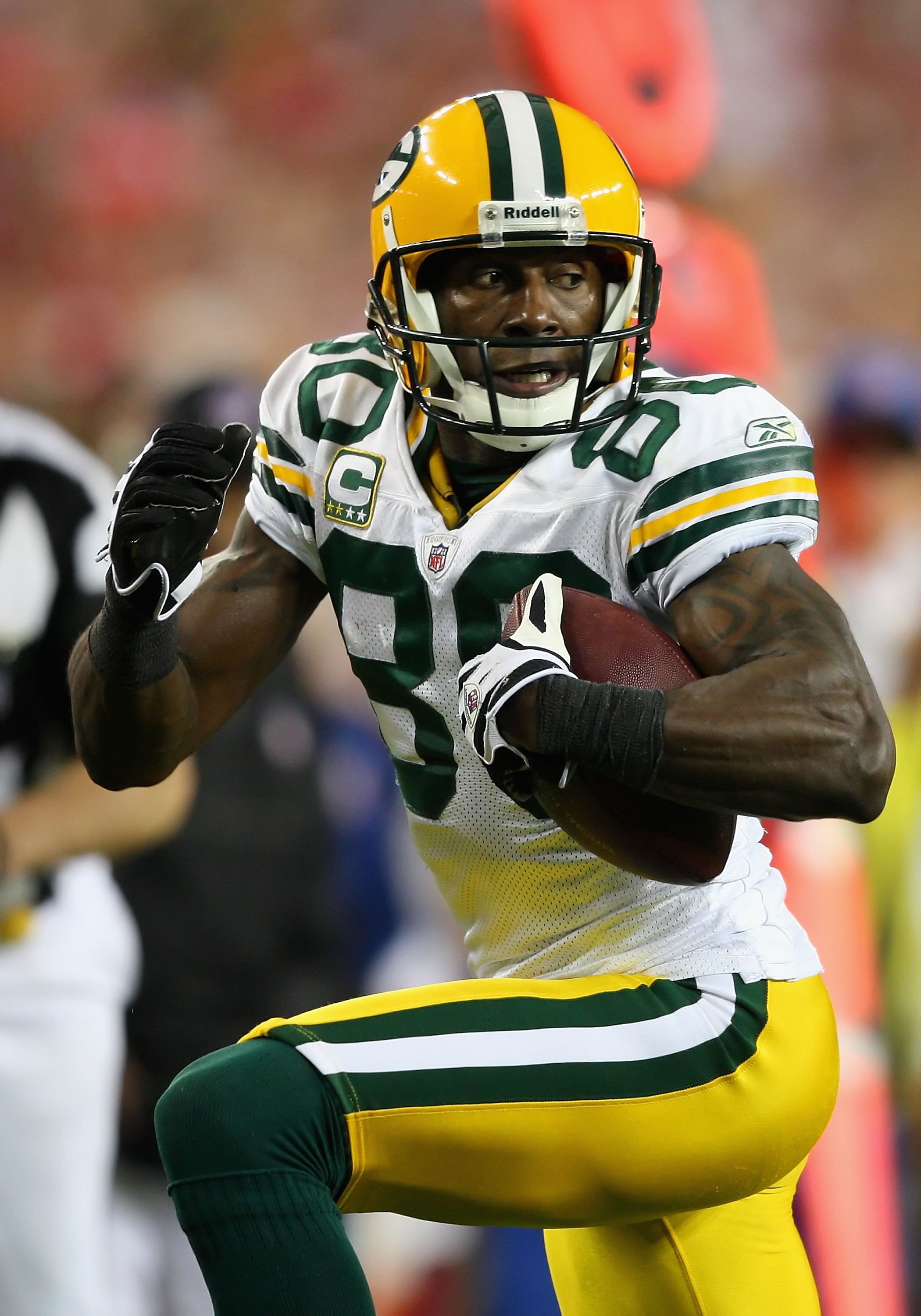 GLENDALE, AZ - JANUARY 10:  Wide receiver Donald Driver #80 of the Green Bay Packers runs with the ball after a reception during the 2010 NFC wild-card playoff game against the Arizona Cardinals at the Universtity of Phoenix Stadium on January 10, 2010 in