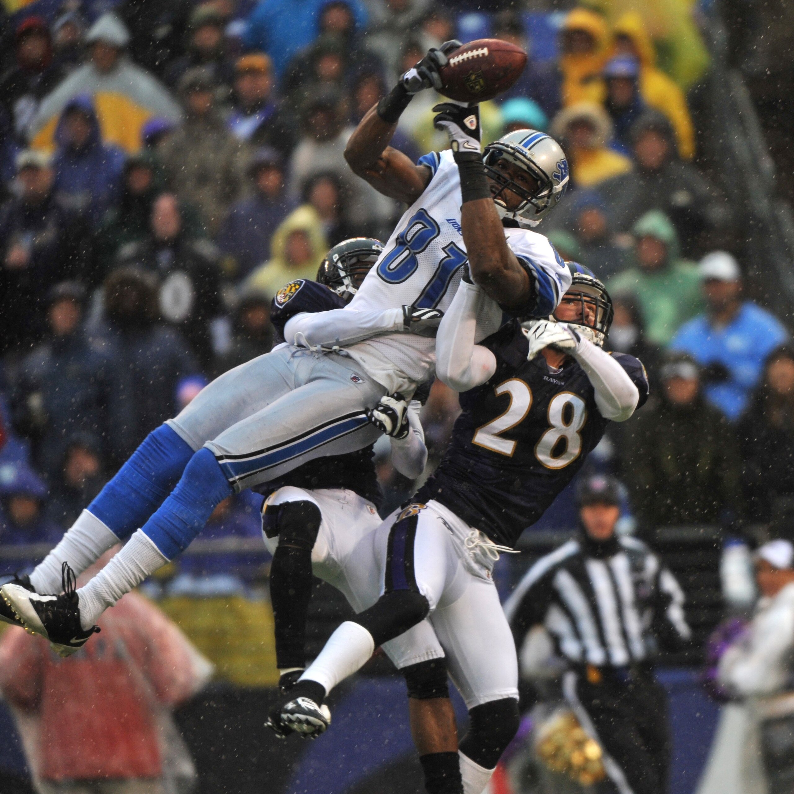 BALTIMORE - DECEMBER 13:  Tom Zbikowski #28 of the Baltimore Ravens defends against the Detroit Lions at M&T Bank Stadium on December 13, 2009 in Baltimore, Maryland. The Ravens defeated the Lions 48-3. (Photo by Larry French/Getty Images)