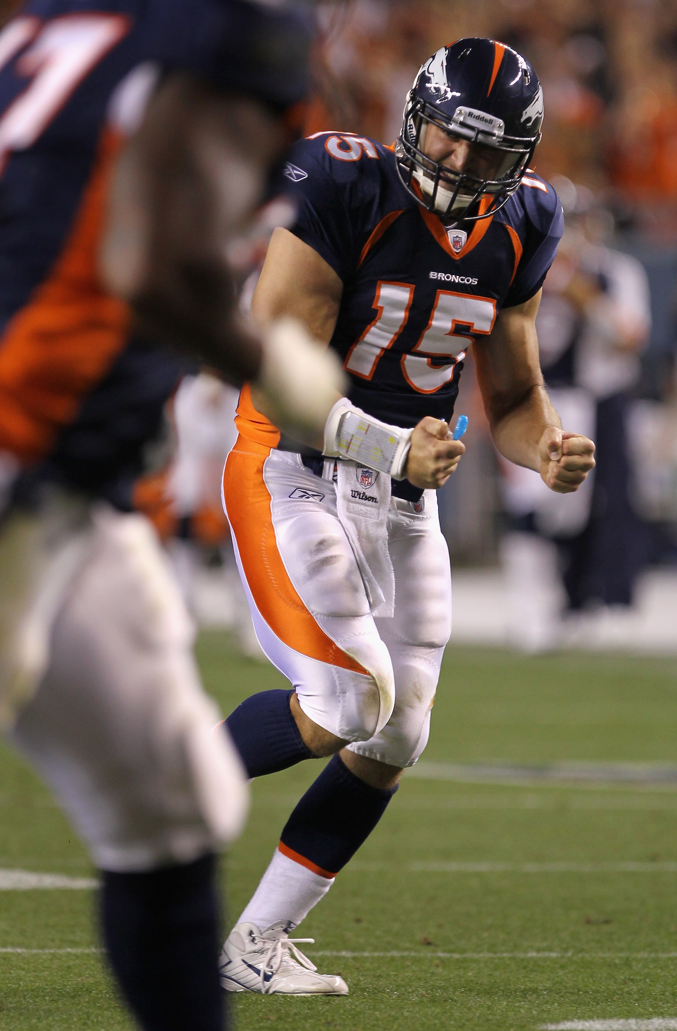 DENVER - AUGUST 29:  Quarterback Tim Tebow #15 of the Denver Broncos celebrates his fourth quarter touchdown pass to Eric Decker against the Pittsburgh Steelers during preseason NFL action at INVESCO Field at Mile High on August 29, 2010 in Denver, Colora