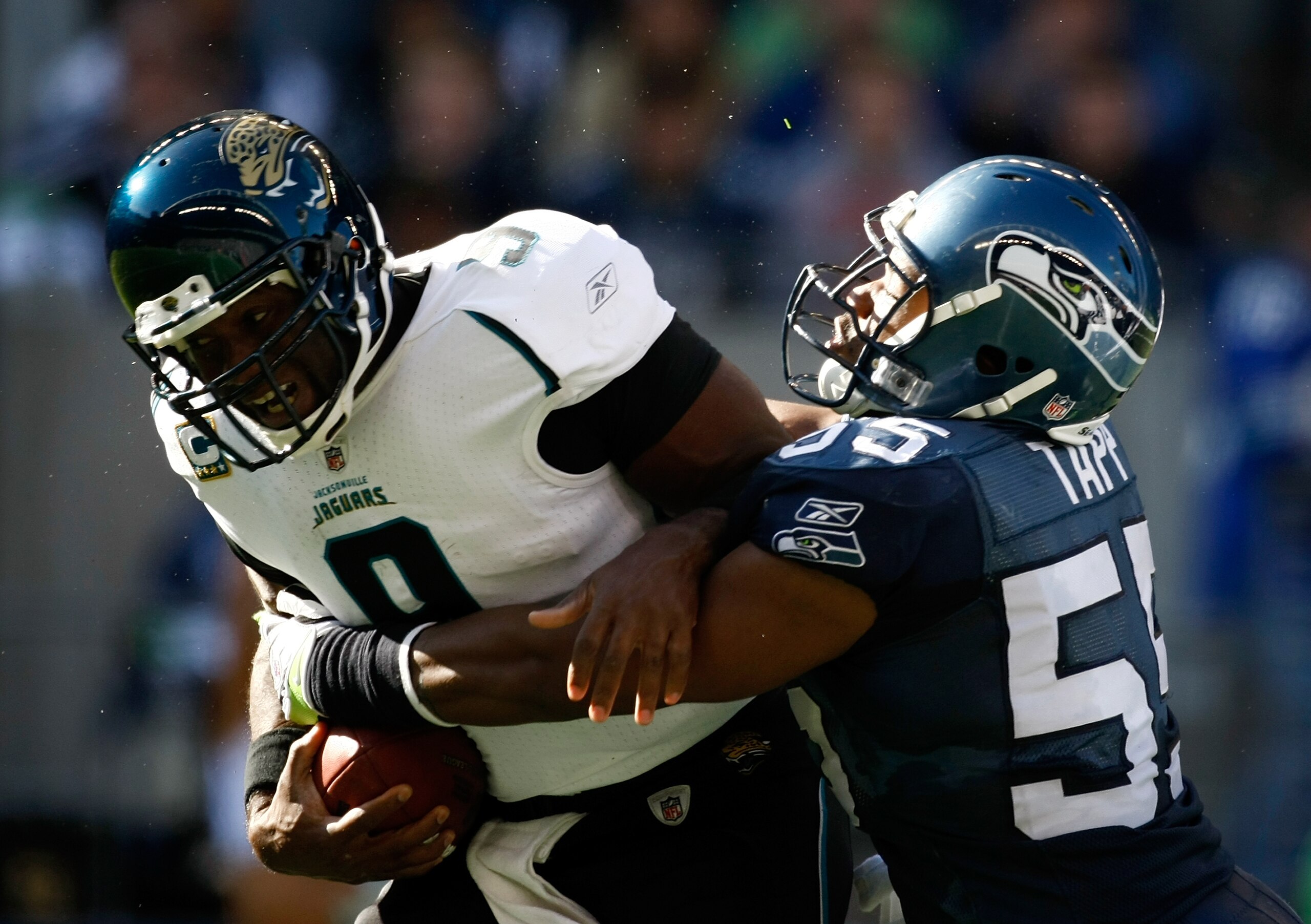 SEATTLE, WA - OCTOBER 11:  Quarterback David Garrard #9 of the Jacksonville Jaguars ids sacked by Darryl Tapp #55 of the Seattle Seahawks   at Qwest Field on October 11, 2009 in Seattle, Washington.  (Photo by Jonathan Ferrey/Getty Images)