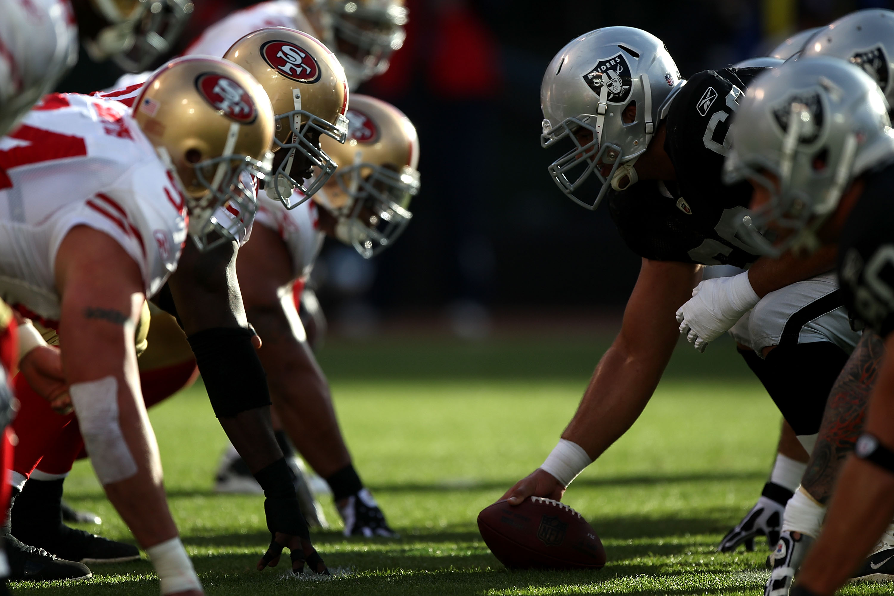 OAKLAND, CA - AUGUST 28:  Members of the Oakland Raiders line up against the San Francisco 49ers during an NFL preseason game at Oakland-Alameda County Coliseum on August 28, 2010 in Oakland, California. (Photo by Jed Jacobsohn/Getty Images)