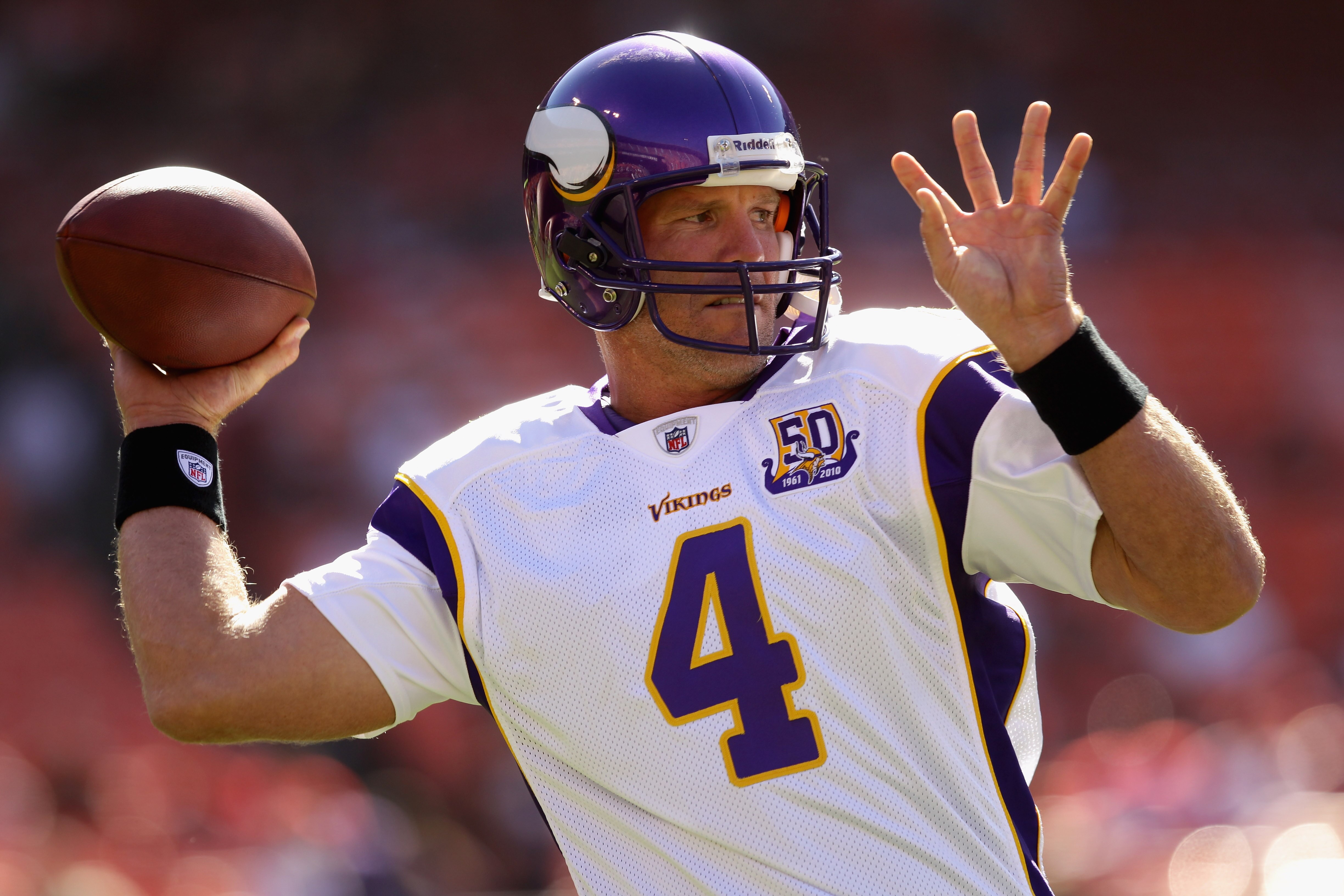 SAN FRANCISCO - AUGUST 22:  Brett Favre #4 of the Minnesota Vikings warms up before their preseason game against the San Francisco 49ers at Candlestick Park on August 22, 2010 in San Francisco, California.  (Photo by Ezra Shaw/Getty Images)