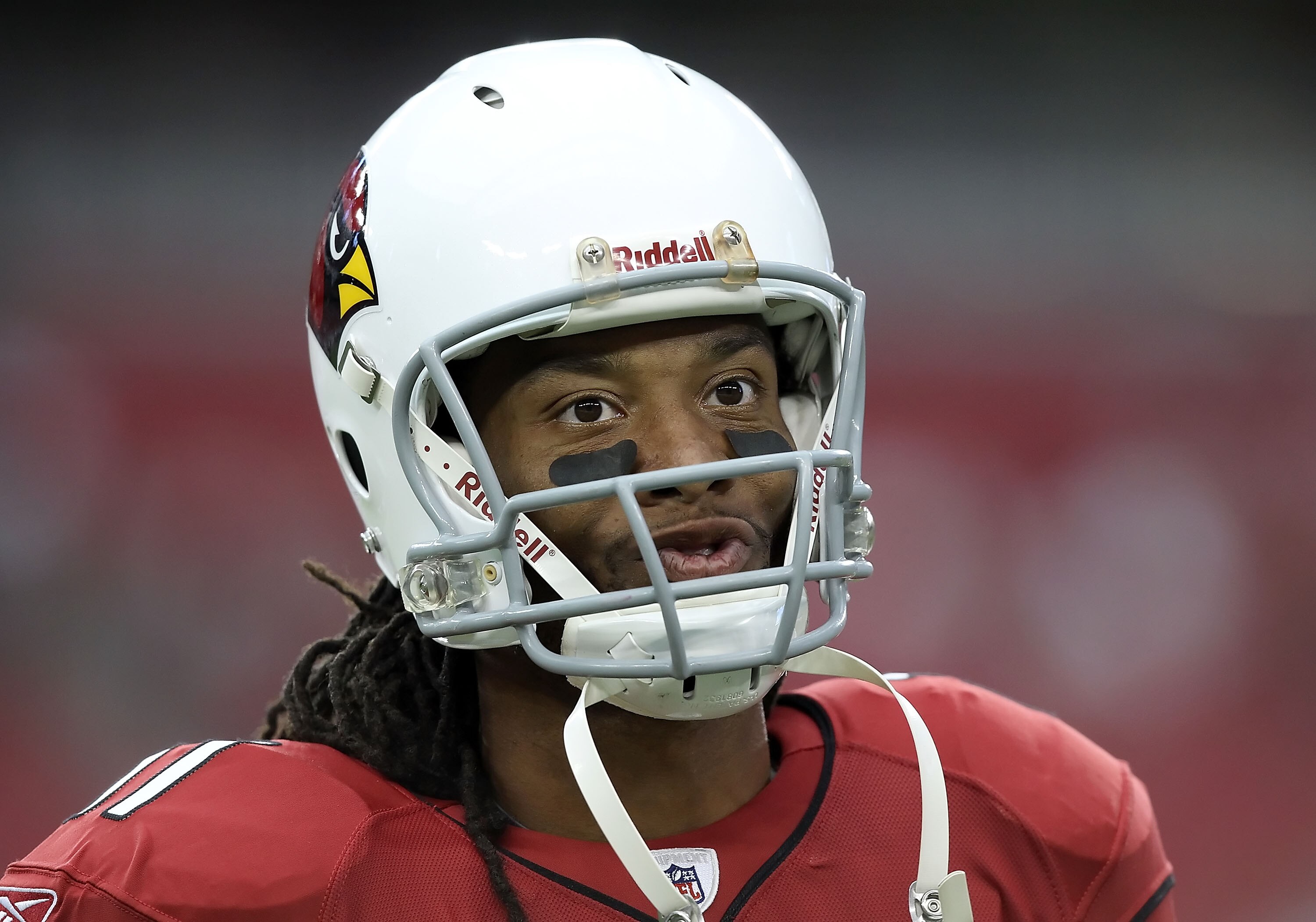 GLENDALE, AZ - AUGUST 14:  Wide receiver Larry Fitzgerald #11 of the Arizona Cardinals during preseason NFL game against the Houston Texans at the University of Phoenix Stadium on August 14, 2010 in Glendale, Arizona.  The Cardinals defeated the Texans 19