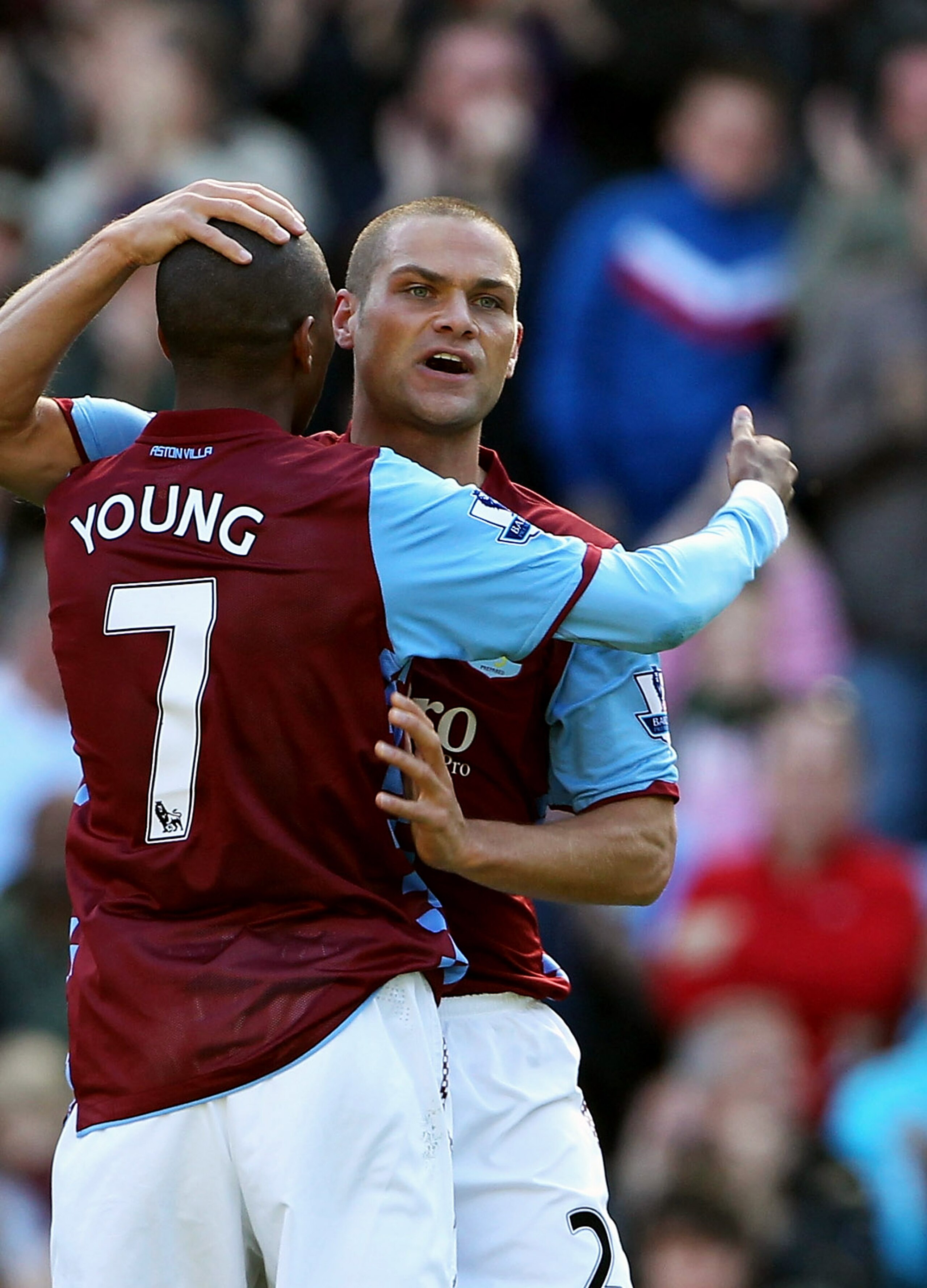 BIRMINGHAM, ENGLAND - AUGUST 29:  Luke Young (R) gets congratulated by Ashley Young of Aston Villa after scoring during the Barclays Premier League match between Aston Villa and Everton at Villa Park on August 29, 2010 in Birmingham, England.  (Photo by P