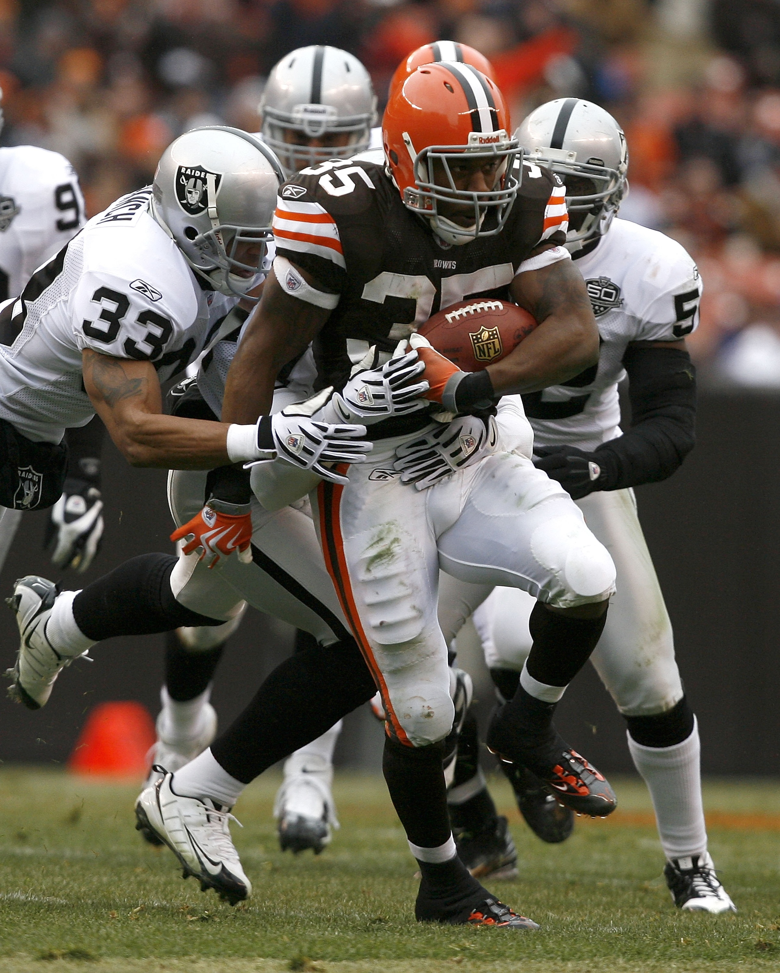 CLEVELAND - DECEMBER 27: Jerome Harrison #35 of the Cleveland Browns runs by Tyvon Branch #33 of the Oakland Raiders at Cleveland Browns Stadium on December 27, 2009 in Cleveland, Ohio. (Photo by Matt Sullivan/Getty Images) CLEVELAND - DECEMBER 27: Jerome Harrison #35 of the Cleveland Browns runs by Tyvon Branch #33 of the Oakland Raiders at Cleveland Browns Stadium on December 27, 2009 in Cleveland, Ohio. (Photo by Matt Sullivan/Getty Images)