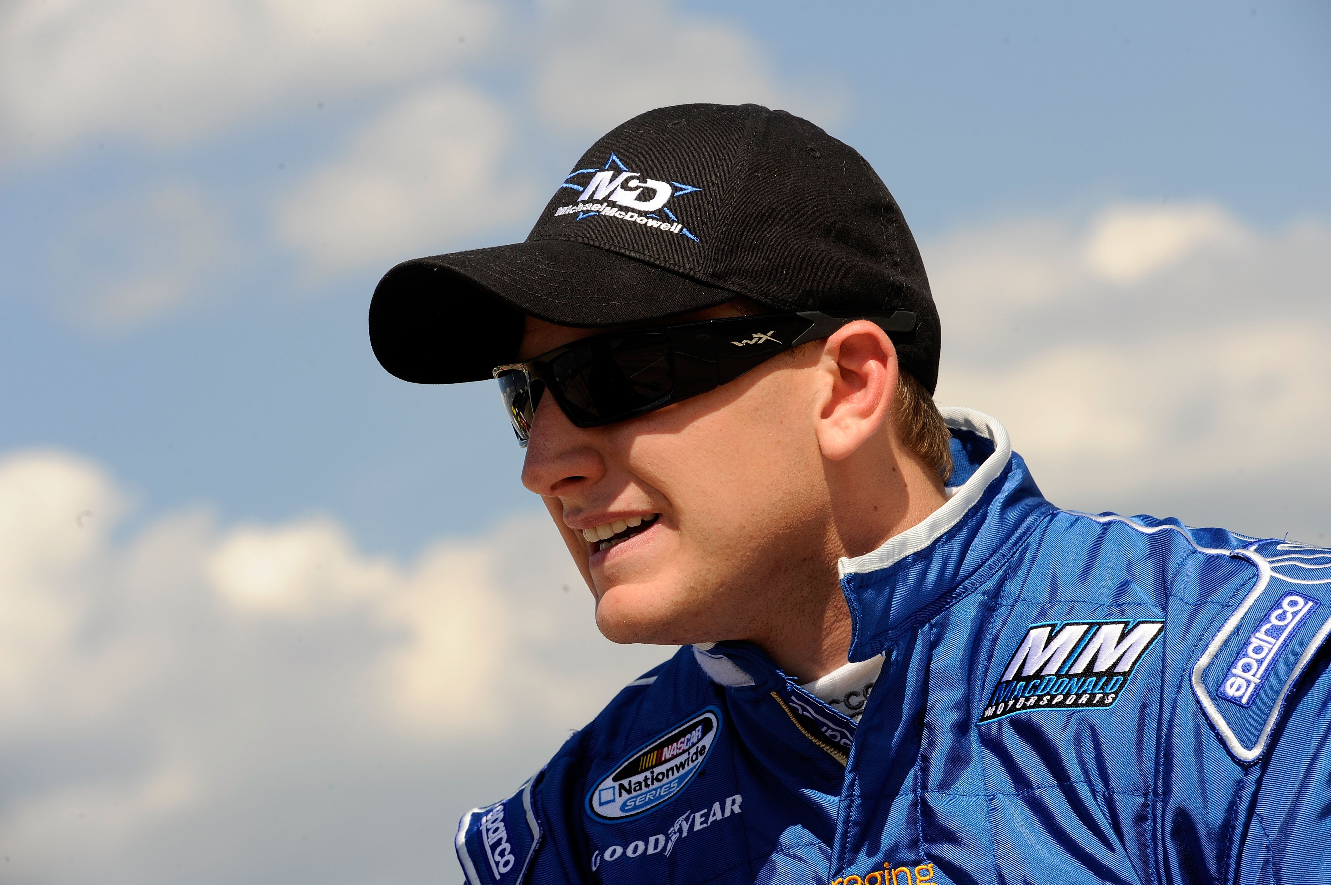 JOLIET, IL - JULY 09:  Michael McDowell, driver of the K Love 94.3 Dodge, looks on during qualifying for the NASCAR Nationwide Series Dollar General 300 Powered by Coca-Cola at the Chicagoland Speedway on July 9, 2010 in Joliet, Illinois.  (Photo by John