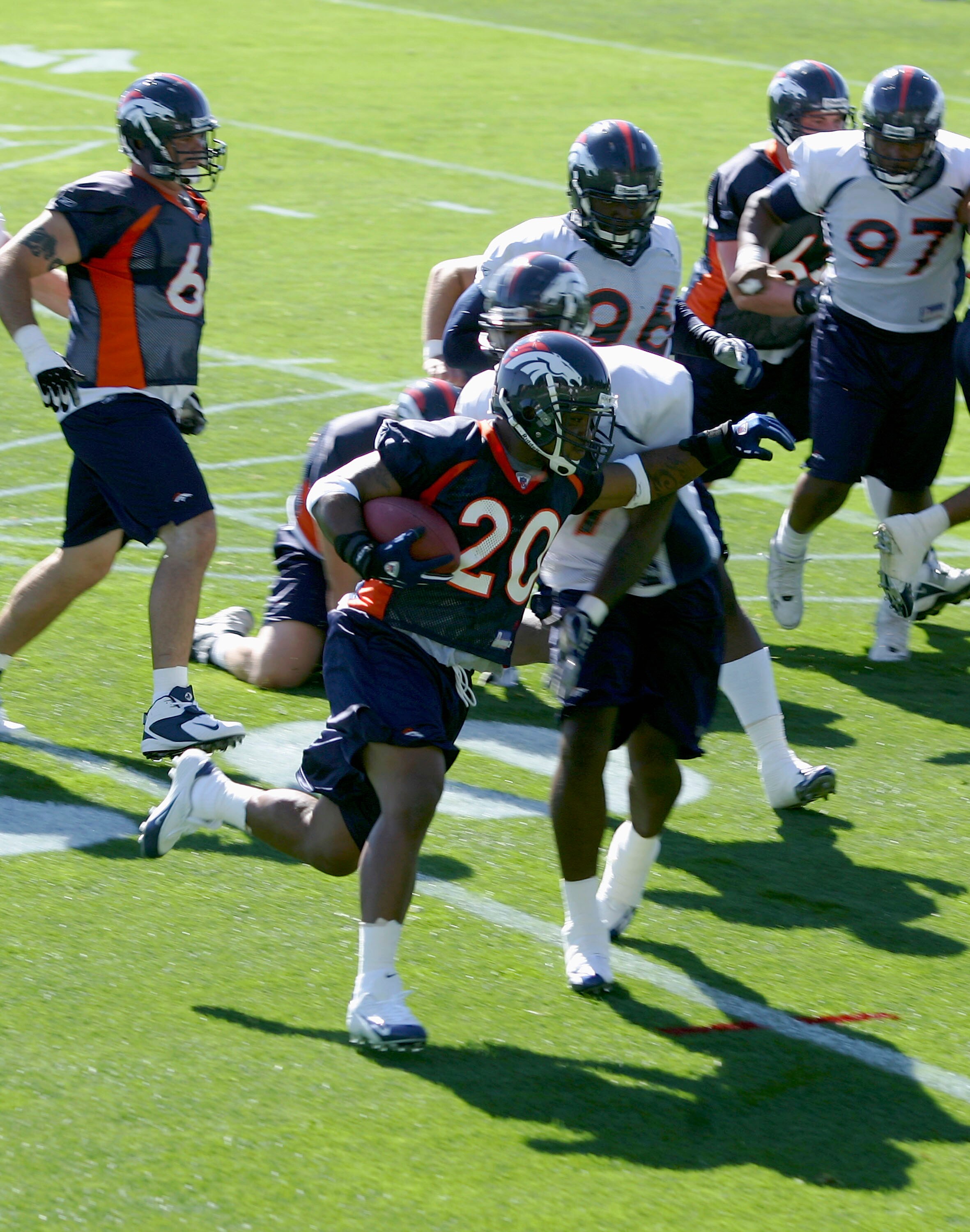 ENGLEWOOD,CO  - JULY 29:  Running back Maurice Clarett #20 of the Denver Broncos runs the ball on the first day of Training Camp at the Broncos Training Facility on July 29, 2005 in Englewood, Colorado. (Photo by Doug Pensinger/Getty Images)