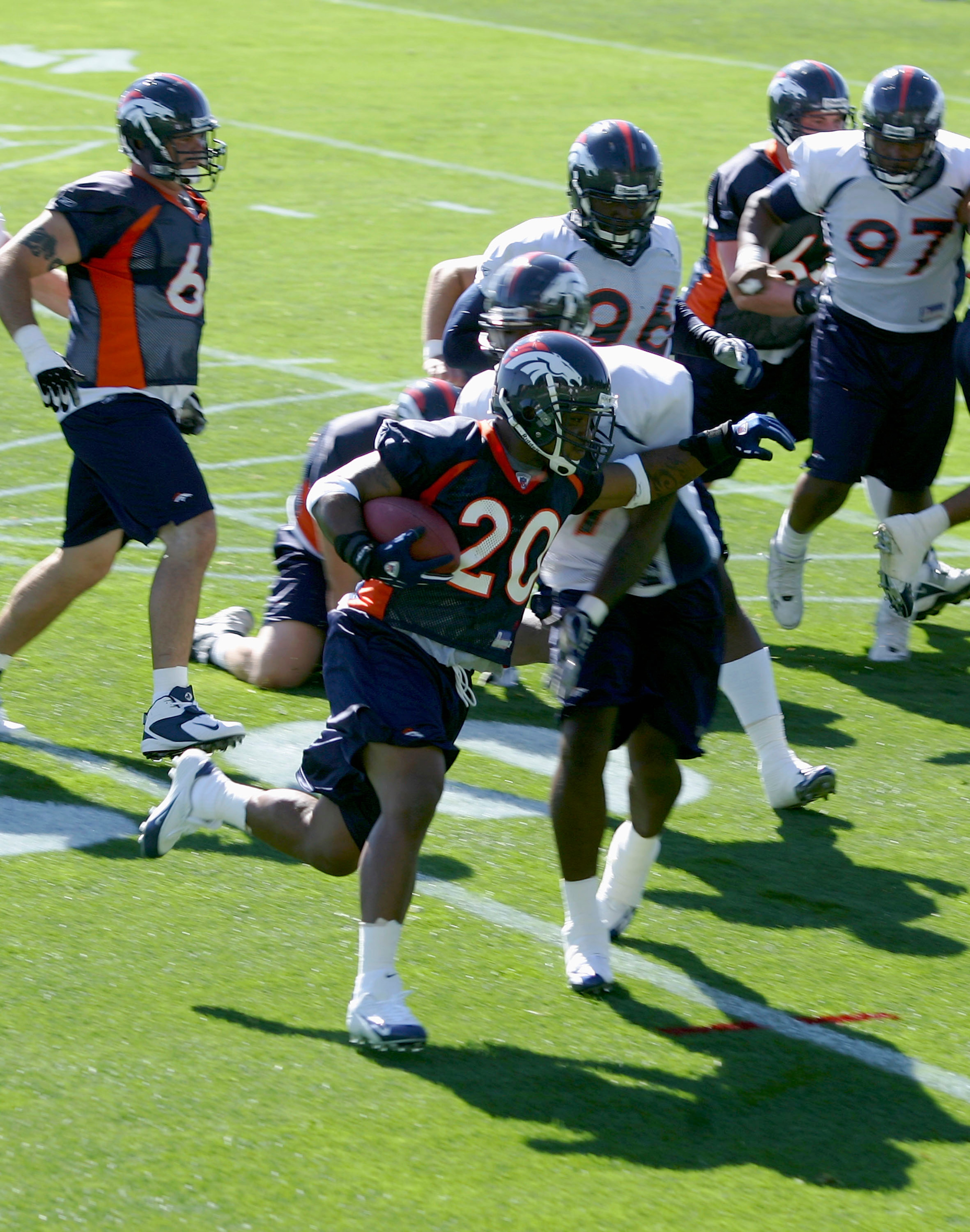 ENGLEWOOD,CO  - JULY 29:  Running back Maurice Clarett #20 of the Denver Broncos runs the ball on the first day of Training Camp at the Broncos Training Facility on July 29, 2005 in Englewood, Colorado. (Photo by Doug Pensinger/Getty Images)