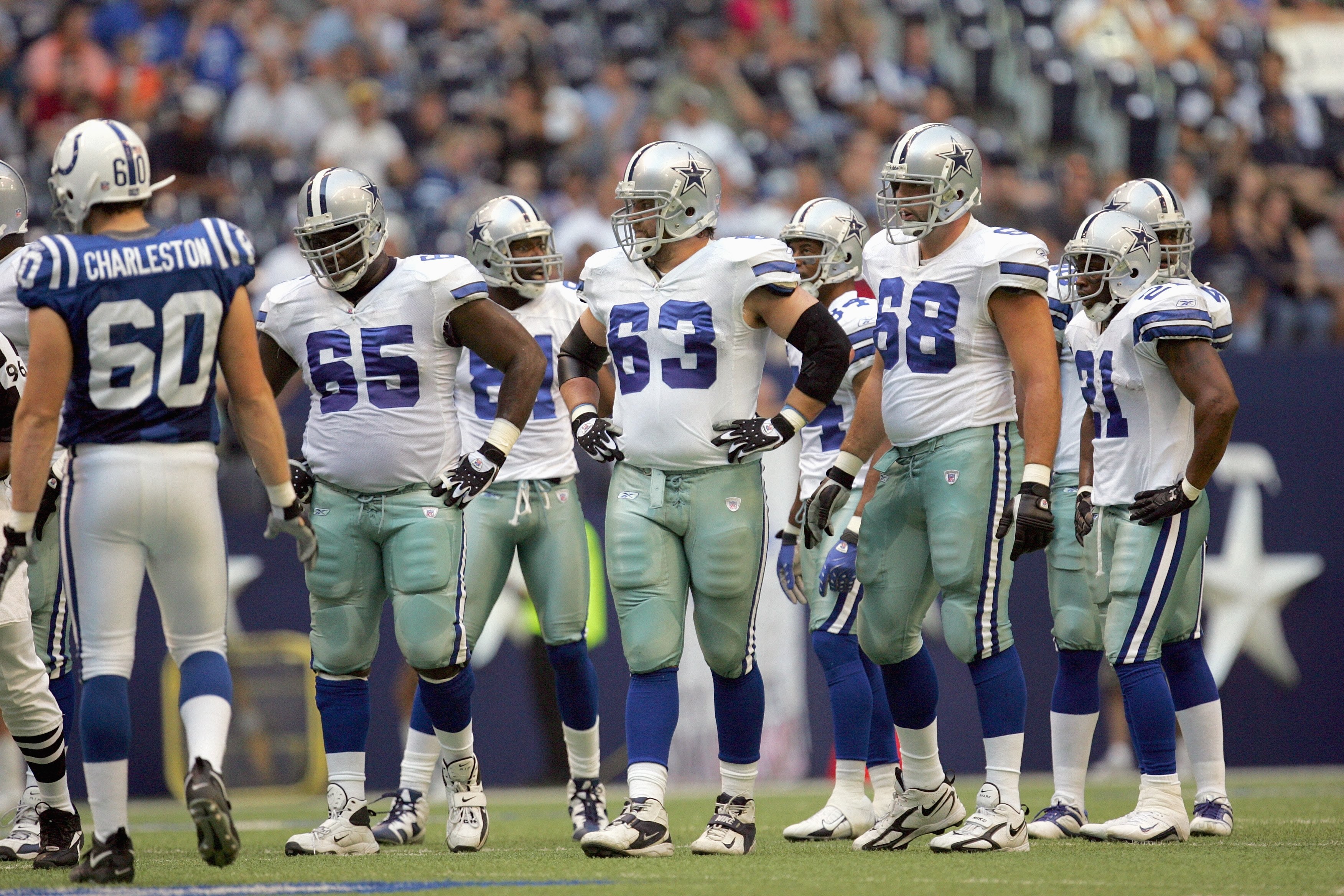 IRVING, TX - AUGUST 9:  Andre Gurode #65 ,Kyle Kosier #63 and Doug Free #68 of the Dallas Cowboys walk to the line during the preseason game against the Indianapolis Colts at Texas Stadium on August 9, 2007 in Irving, Texas. (Photo by Ronald Martinez/Gett