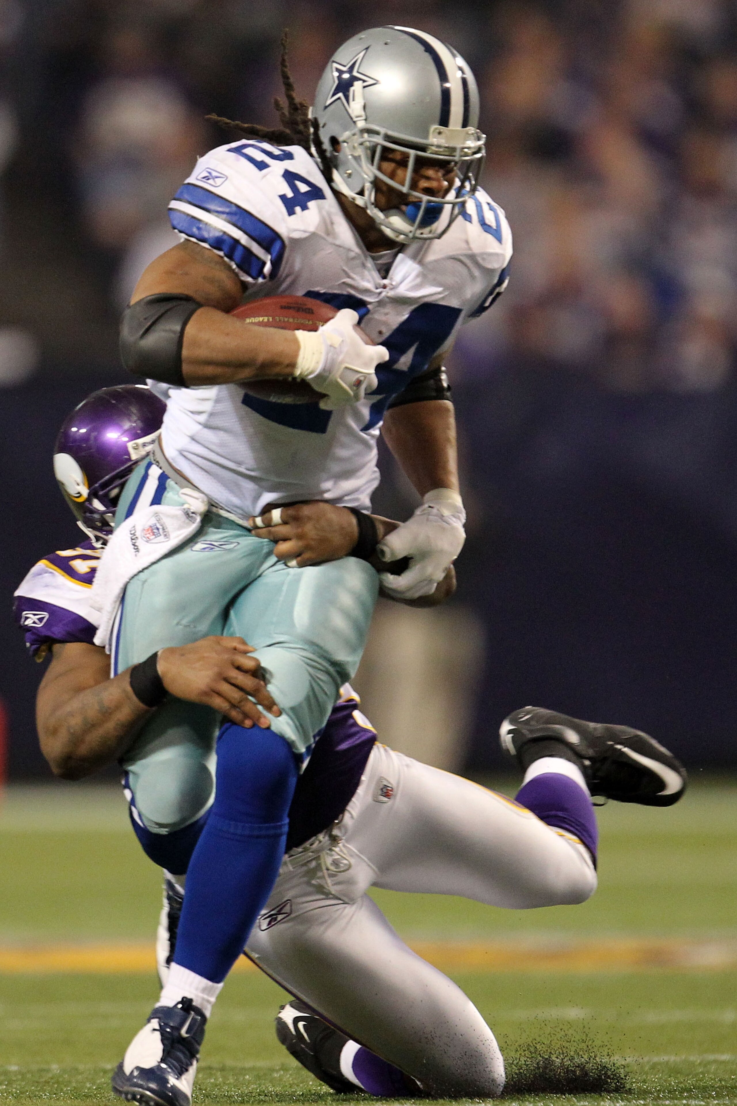 MINNEAPOLIS - JANUARY 17: Defensive end Ray Edwards #91 of the Minnesota Vikings tackles Marion Barber #24 of the Dallas Cowboys during the third quarter of the NFC Divisional Playoff Game at Hubert H. Humphrey Metrodome on January 17, 2010 in Minneapoli MINNEAPOLIS - JANUARY 17: Defensive end Ray Edwards #91 of the Minnesota Vikings tackles Marion Barber #24 of the Dallas Cowboys during the third quarter of the NFC Divisional Playoff Game at Hubert H. Humphrey Metrodome on January 17, 2010 in Minneapoli