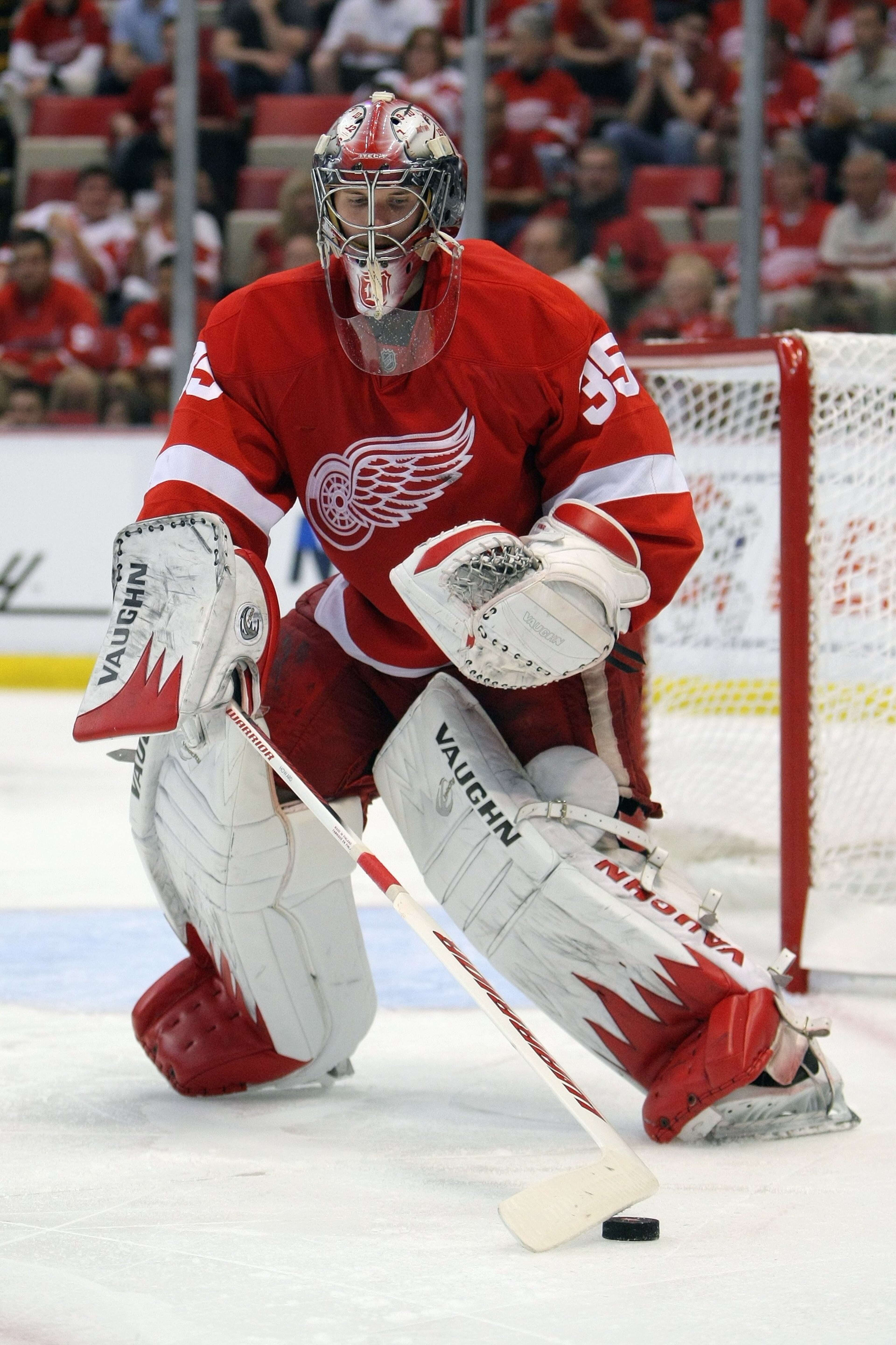 DETROIT - MAY 4: Jimmy Howard #35 of the Detroit Red Wings defends the net against the San Jose Sharks in Game Three of the Western Conference Semifinals during the 2010 Stanley Cup Playoffs at Joe Louis Arena on May 4, 2010 in Detroit, Michigan. (Photo DETROIT - MAY 4: Jimmy Howard #35 of the Detroit Red Wings defends the net against the San Jose Sharks in Game Three of the Western Conference Semifinals during the 2010 Stanley Cup Playoffs at Joe Louis Arena on May 4, 2010 in Detroit, Michigan. (Photo