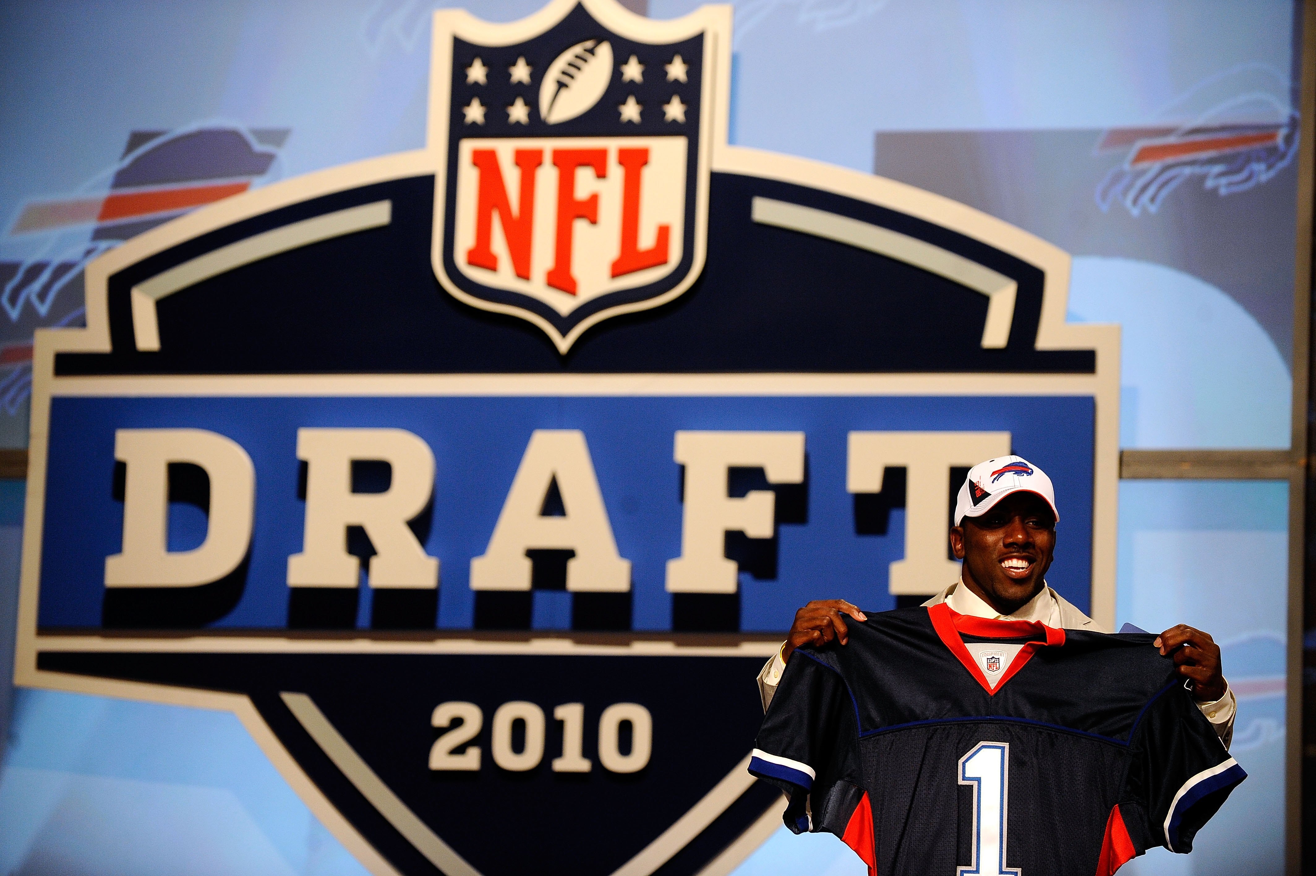 NEW YORK - APRIL 22:  C.J. Spiller from the Clemson Tigers holds up a Buffalo Bills jersey after he was selected number 9 overall by the Bills during the first round of the 2010 NFL Draft at Radio City Music Hall on April 22, 2010 in New York City.  (Phot