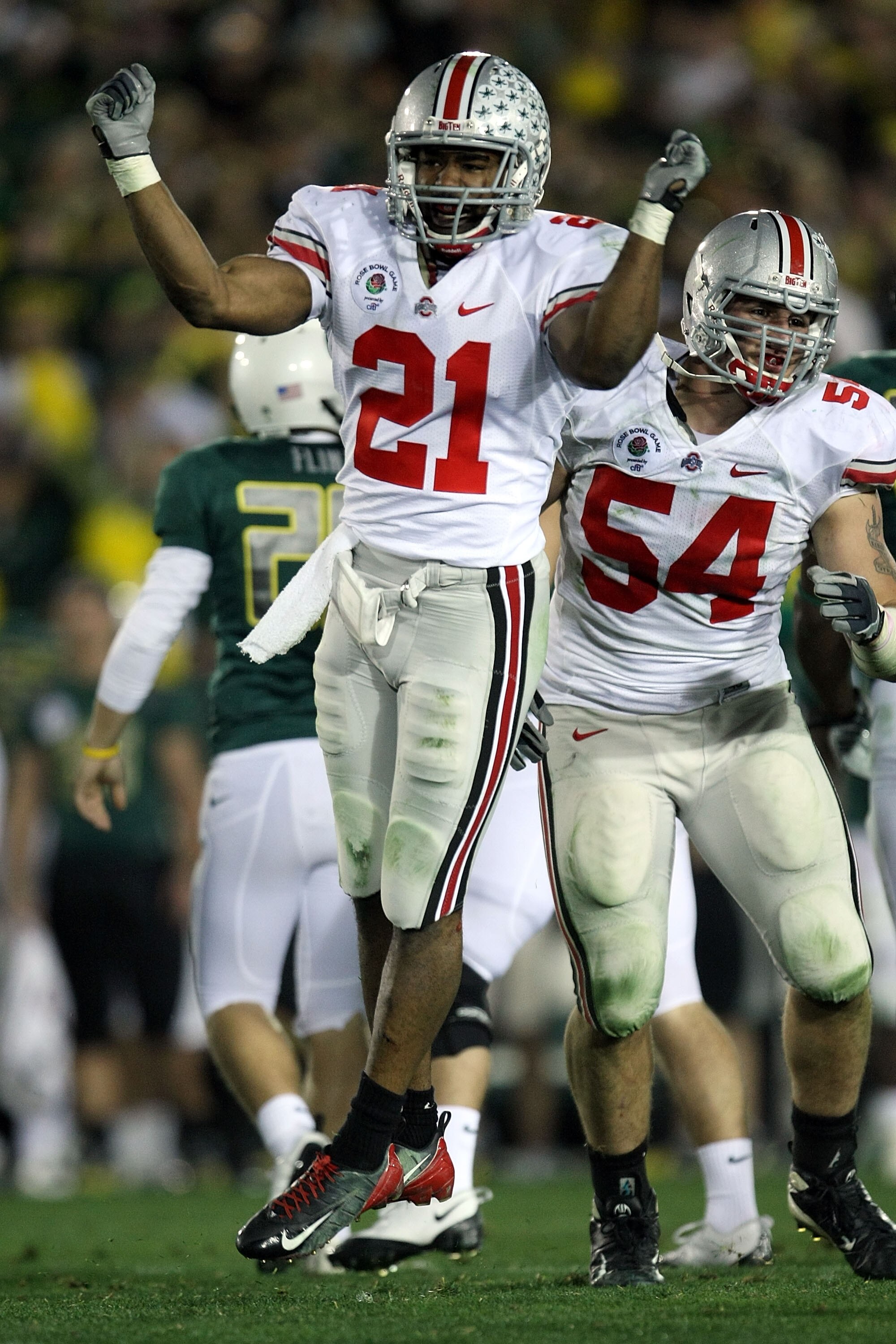 PASADENA, CA - JANUARY 01:  Anderson Russell #21 of the Ohio State Buckeyes reacts after a stop on defense against the Oregon Ducks in the fourth quarter in the 96th Rose Bowl game on January 1, 2010 in Pasadena, California.  (Photo by Stephen Dunn/Getty