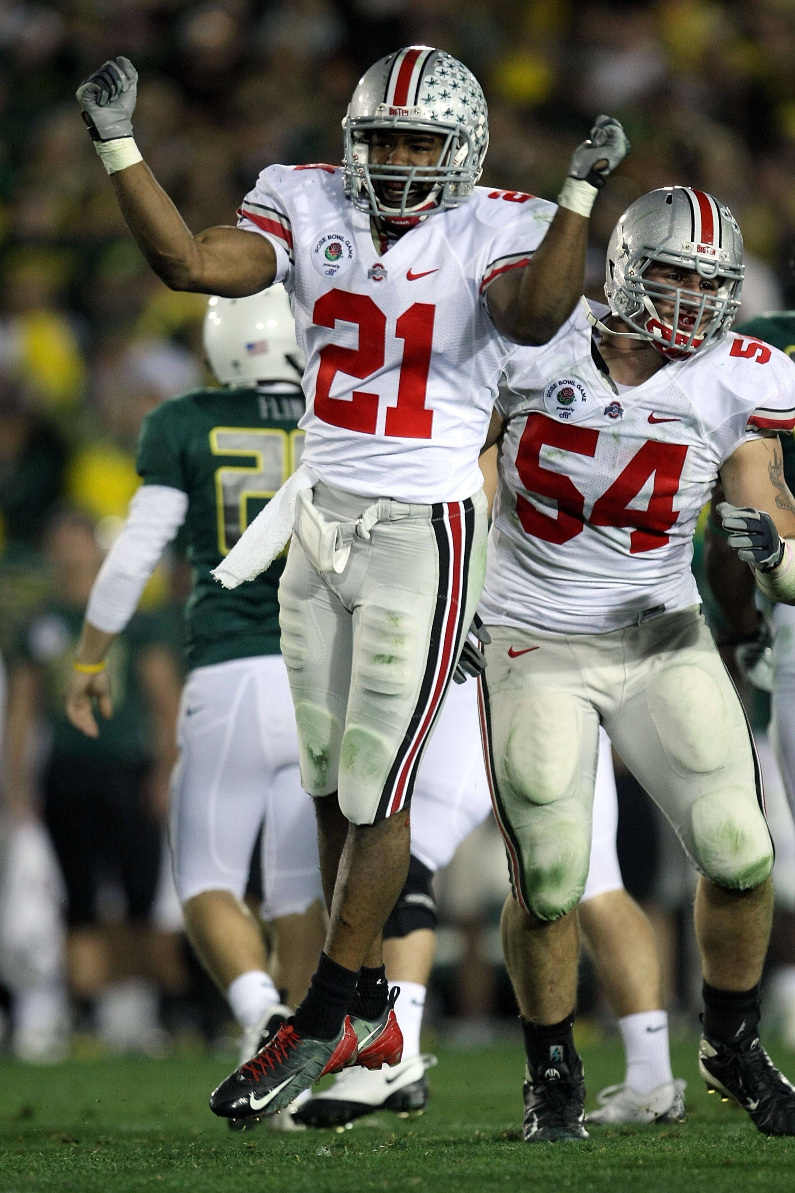 PASADENA, CA - JANUARY 01:  Anderson Russell #21 of the Ohio State Buckeyes reacts after a stop on defense against the Oregon Ducks in the fourth quarter in the 96th Rose Bowl game on January 1, 2010 in Pasadena, California.  (Photo by Stephen Dunn/Getty