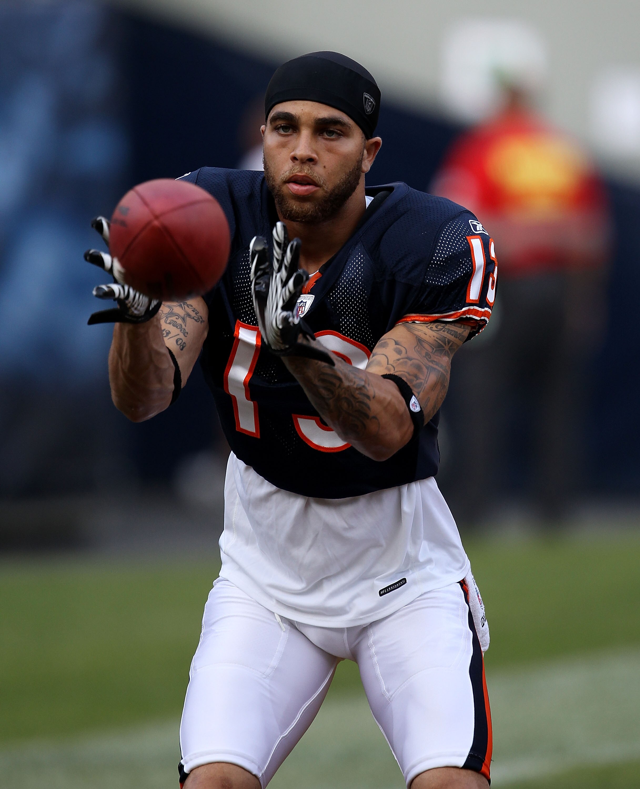 CHICAGO - AUGUST 21: Johnny Knox #13 of the Chicago Bears warms-up before a preseason game against the Oakland Raiders at Soldier Field on August 21, 2010 in Chicago, Illinois. The Radiers defeated the Bears 32-17. (Photo by Jonathan Daniel/Getty Images)