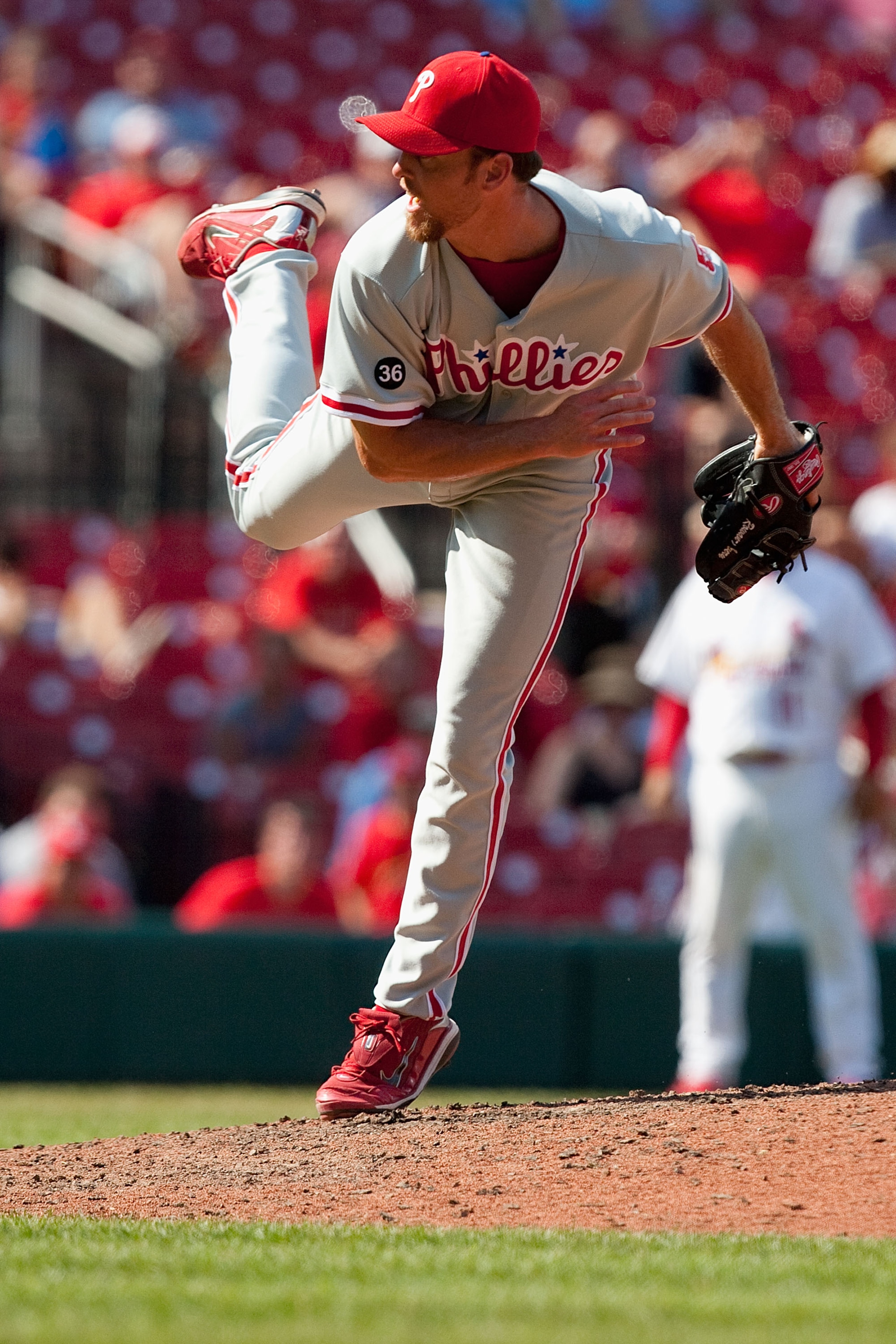 ST. LOUIS - JULY 22: Relief pitcher Brad Lidge #54 of the Philadelphia Phillies throws against the St. Louis Cardinals at Busch Stadium on July 22, 2010 in St. Louis, Missouri. The Phillies defeated the Cardinals 2-0.  (Photo by Dilip Vishwanat/Getty Imag
