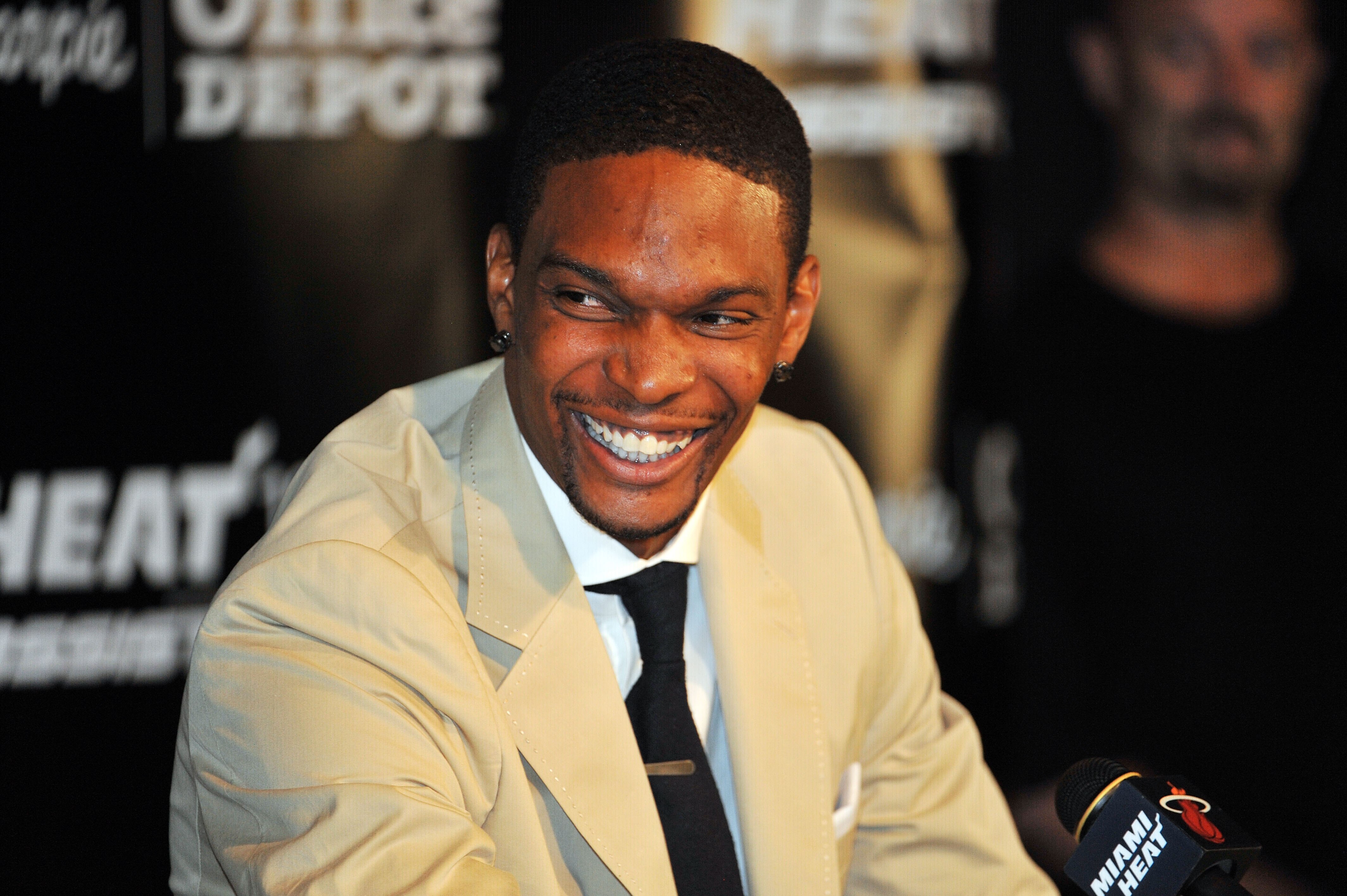 MIAMI - JULY 09:  Chris Bosh #1 of the Miami Heat talks during a press conference after a welcome party at American Airlines Arena on July 9, 2010 in Miami, Florida.  (Photo by Doug Benc/Getty Images)