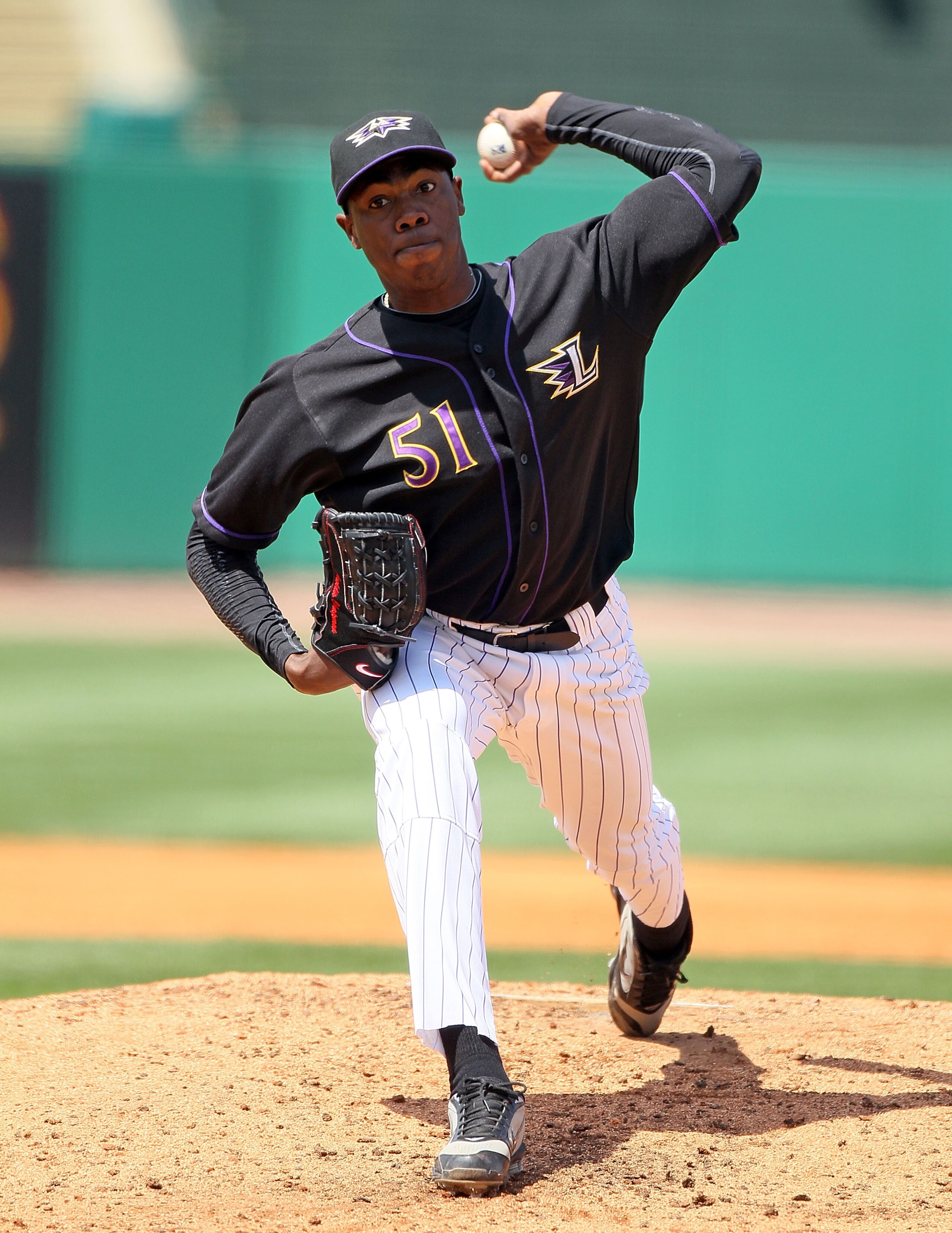 LOUISVILLE, KY - MAY 09:  Oroldis Chapman #51 of the Louisville Bats throws a pitch during the game against the Rochester Red Wings at Louisville Slugger Field on May 9, 2010 in Louisville, Kentucky.  (Photo by Andy Lyons/Getty Images)