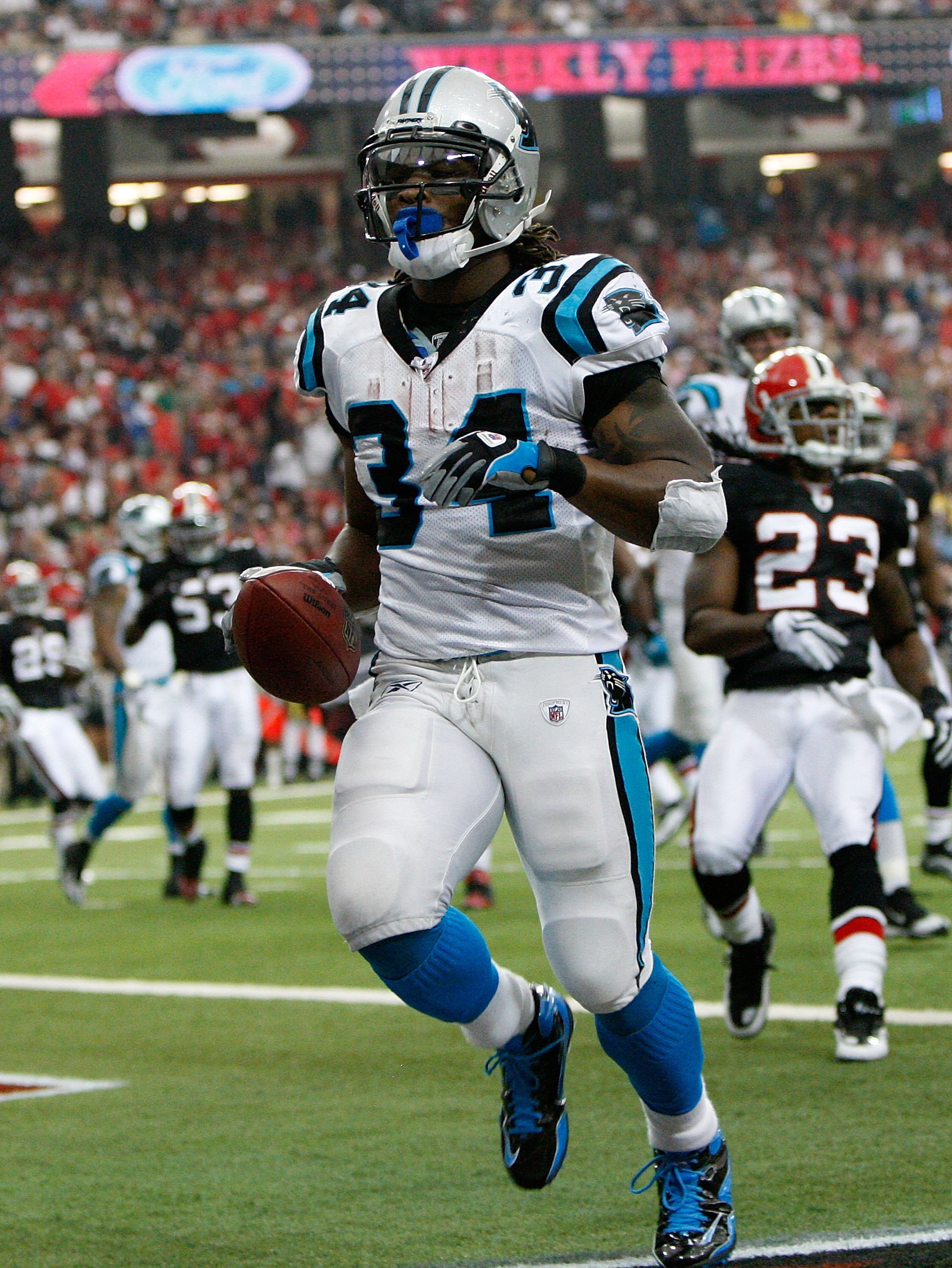 ATLANTA - SEPTEMBER 20:  DeAngelo Williams #34 of the Carolina Panthers is slow to get up against the Atlanta Falcons at Georgia Dome on September 20, 2009 in Atlanta, Georgia.  (Photo by Kevin C. Cox/Getty Images)