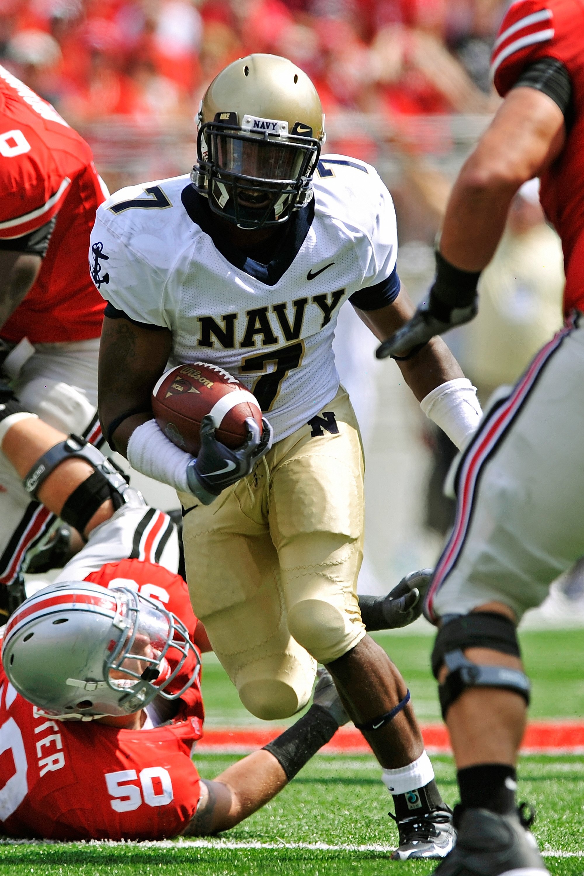 COLUMBUS, OH - SEPTEMBER 05:  Emmett Merchant #7 of the Navy Midshipmen returns an interception against the Ohio State Buckeyes at Ohio Stadium on September 5, 2009 in Columbus, Ohio.  (Photo by Jamie Sabau/Getty Images)