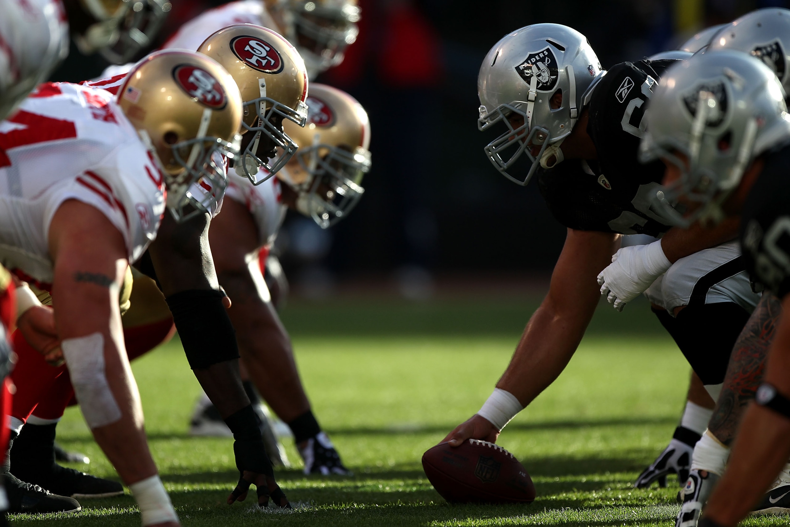 OAKLAND, CA - AUGUST 28:  Members of the Oakland Raiders line up against the San Francisco 49ers during an NFL preseason game at Oakland-Alameda County Coliseum on August 28, 2010 in Oakland, California. (Photo by Jed Jacobsohn/Getty Images)