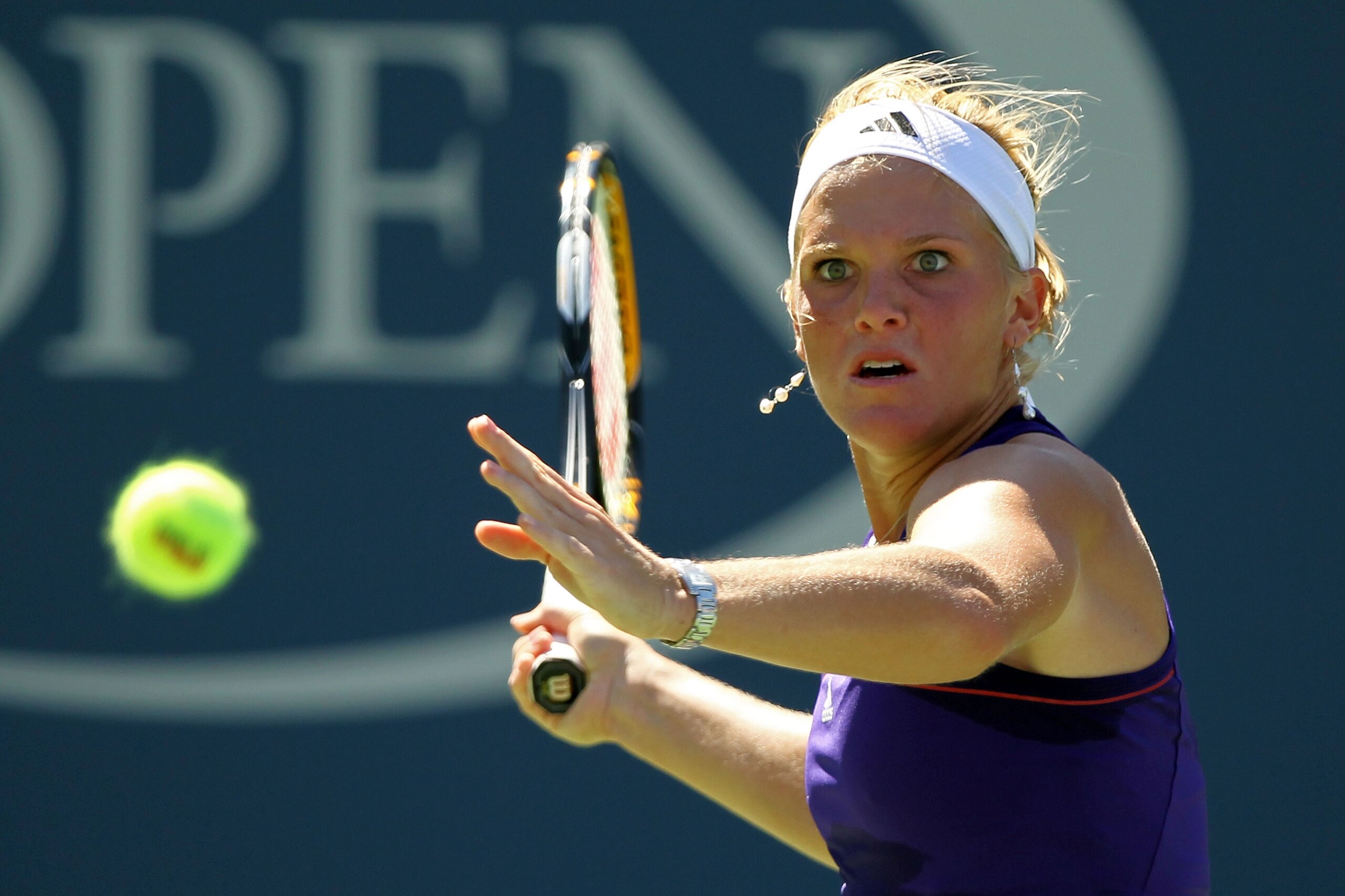 NEW YORK - AUGUST 30:  Melanie Oudin of the United States returns a forehand against Olga Savchuk of the Ukraine during her first round women's single match on day one of the 2010 U.S. Open at the USTA Billie Jean King National Tennis Center on August 30,