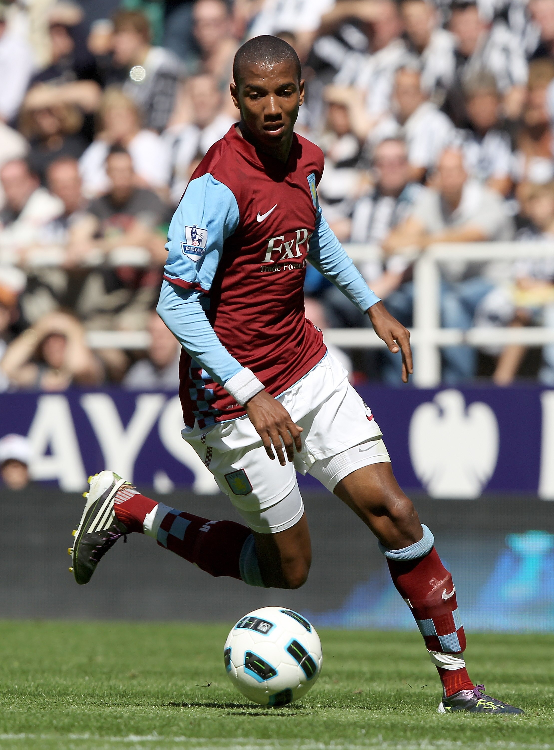 NEWCASTLE UPON TYNE, ENGLAND - AUGUST 22:  Ashley Young of Aston Villa in action during the Barclays Premier League match between Newcastle United and Aston Villa at St James' Park on August 22, 2010 in Newcastle upon Tyne, England.  (Photo by Clive Bruns