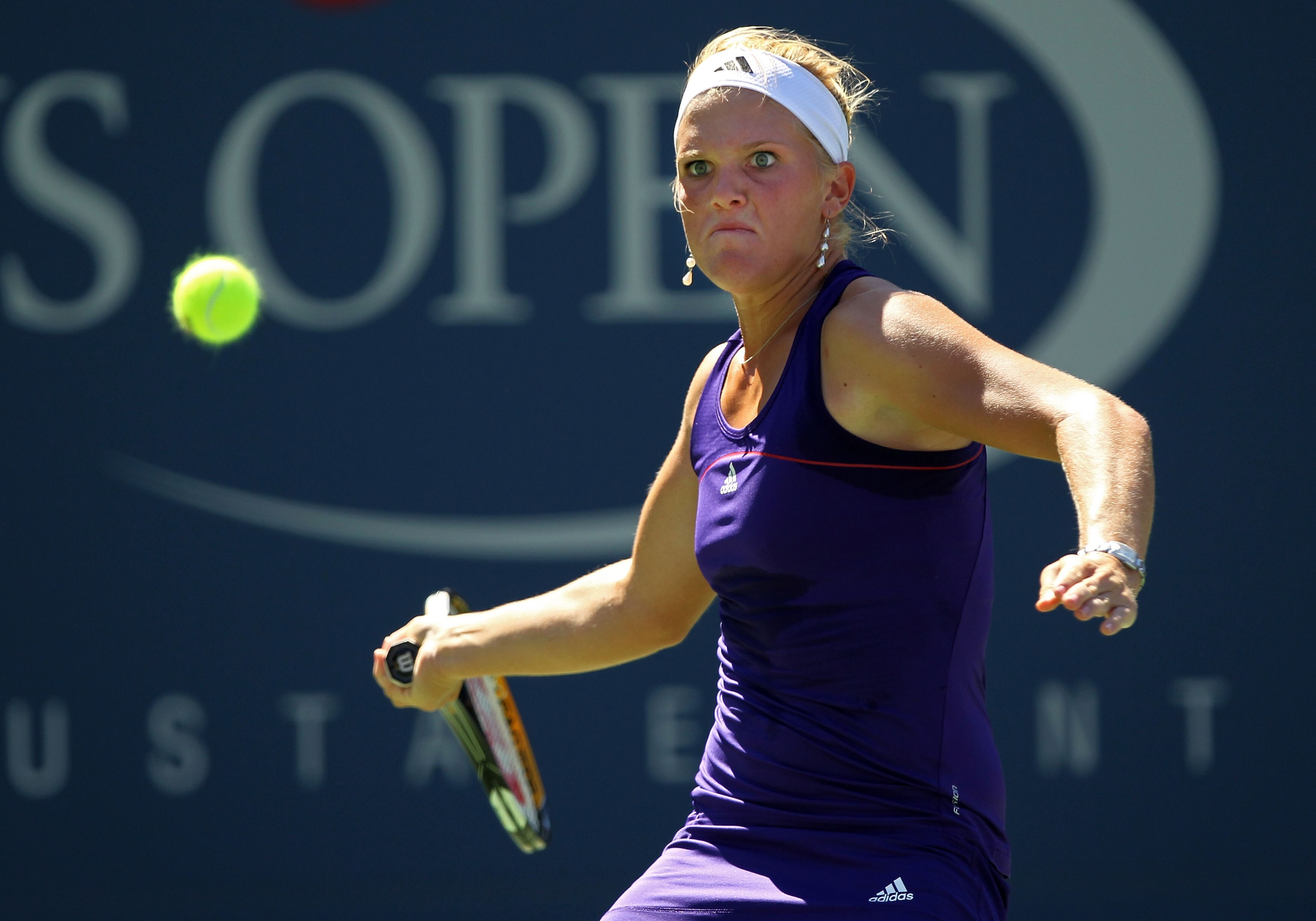 NEW YORK - AUGUST 30:  Melanie Oudin of the United States returns a forehand against Olga Savchuk of the Ukraine during her first round women's single match on day one of the 2010 U.S. Open at the USTA Billie Jean King National Tennis Center on August 30,
