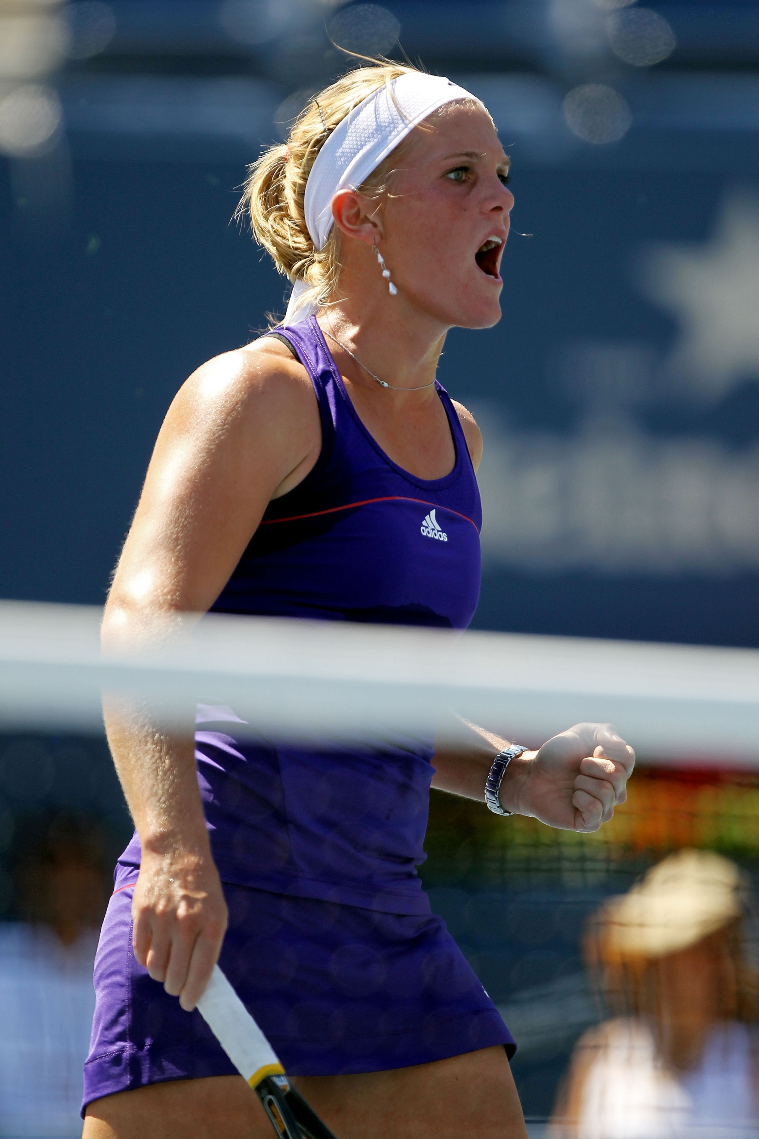 NEW YORK - AUGUST 30:  Melanie Oudin of the United States celebrates after winning the first set against Olga Savchuk of the Ukraine during her first round women's single match on day one of the 2010 U.S. Open at the USTA Billie Jean King National Tennis 