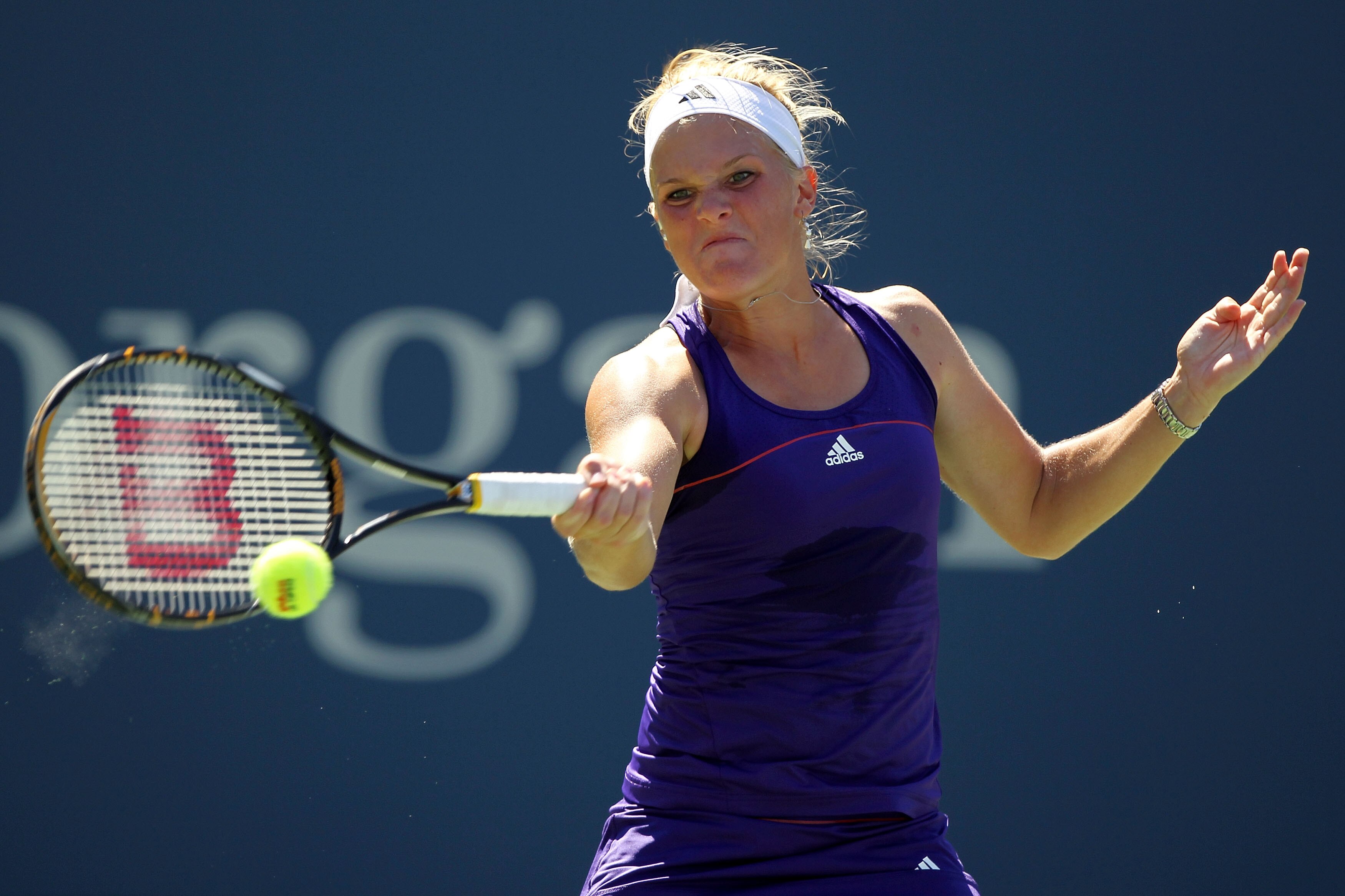 NEW YORK - AUGUST 30:  Melanie Oudin of the United States returns a forehand against Olga Savchuk of the Ukraine during her first round women's single match on day one of the 2010 U.S. Open at the USTA Billie Jean King National Tennis Center on August 30,